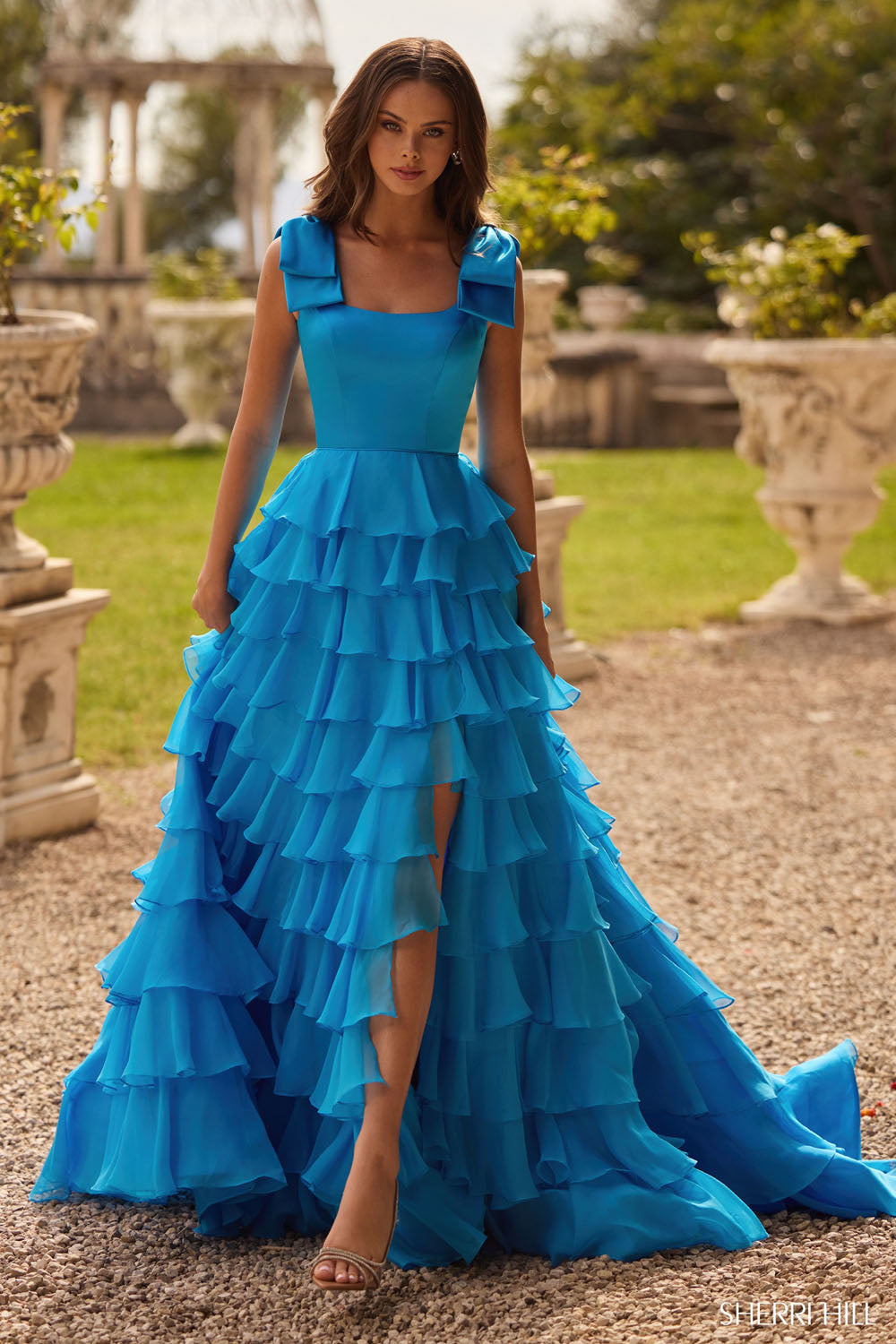 Sherri Hill 57215 prom dress images. Sherri Hill 57215 is available in these colors: Yellow, Orange, Blush, Royal, Emerald, Coral, Bright Pink, Ivory, Lilac, Light Blue, Red, Black, Ocean Blue.