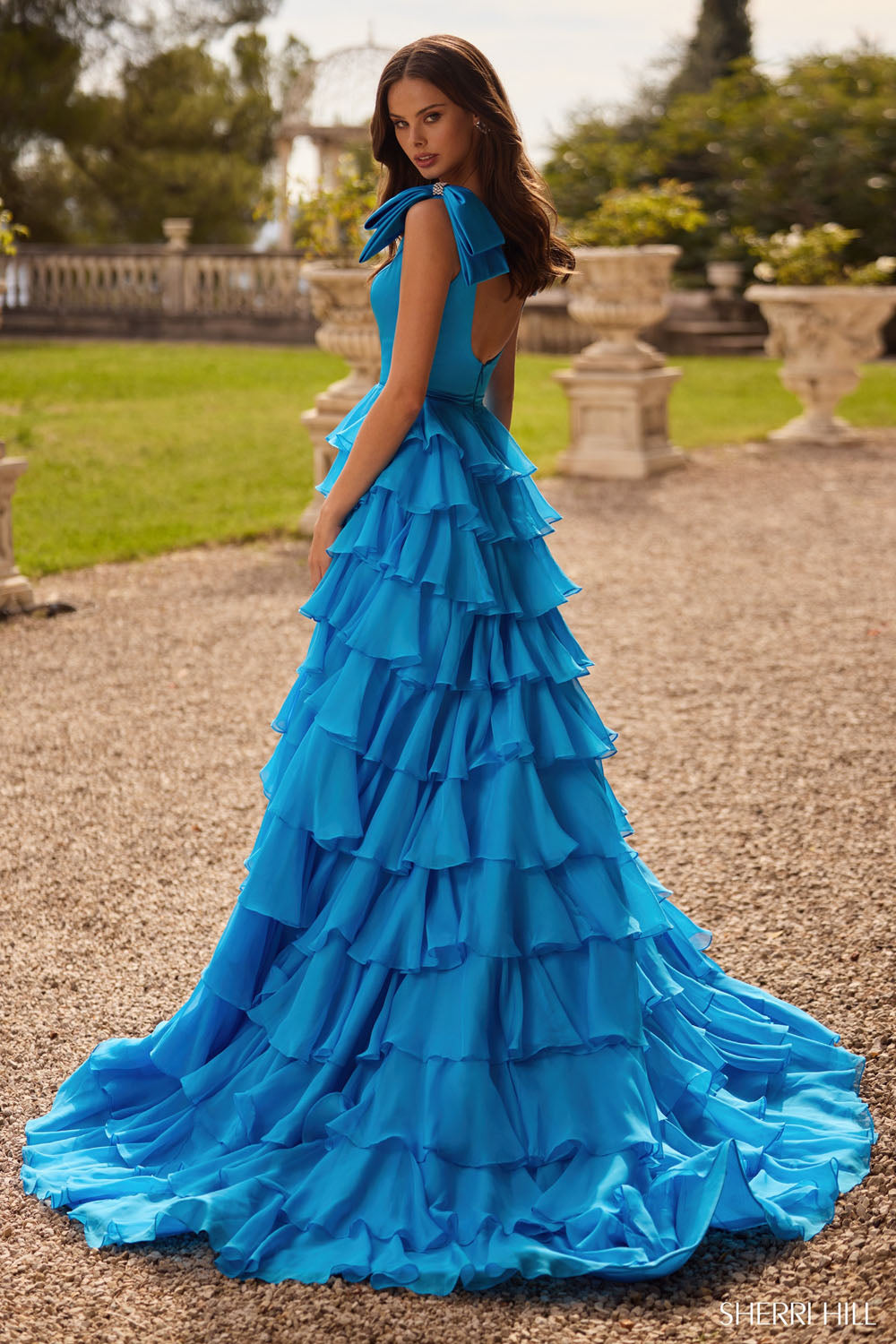 Sherri Hill 57215 prom dress images. Sherri Hill 57215 is available in these colors: Yellow, Orange, Blush, Royal, Emerald, Coral, Bright Pink, Ivory, Lilac, Light Blue, Red, Black, Ocean Blue.