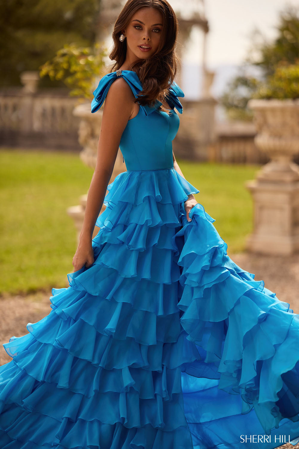 Sherri Hill 57215 prom dress images. Sherri Hill 57215 is available in these colors: Yellow, Orange, Blush, Royal, Emerald, Coral, Bright Pink, Ivory, Lilac, Light Blue, Red, Black, Ocean Blue.