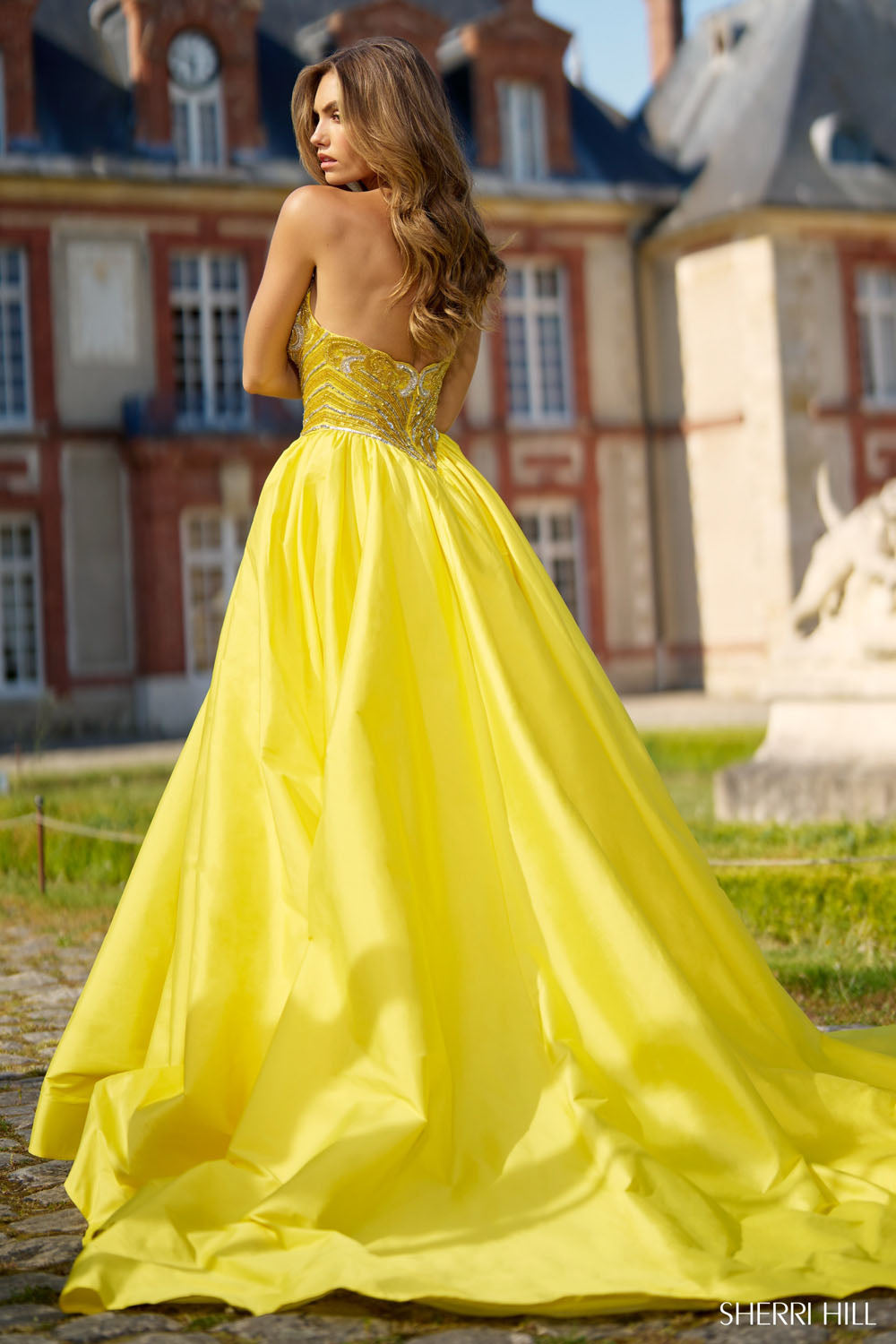 Sherri Hill 67019 prom dress images. Sherri Hill 67019 is available in these colors: Yellow Silver, Red Fuchsia, Aqua Silver, Light Blue Silver, Emerald, Bright Pink.