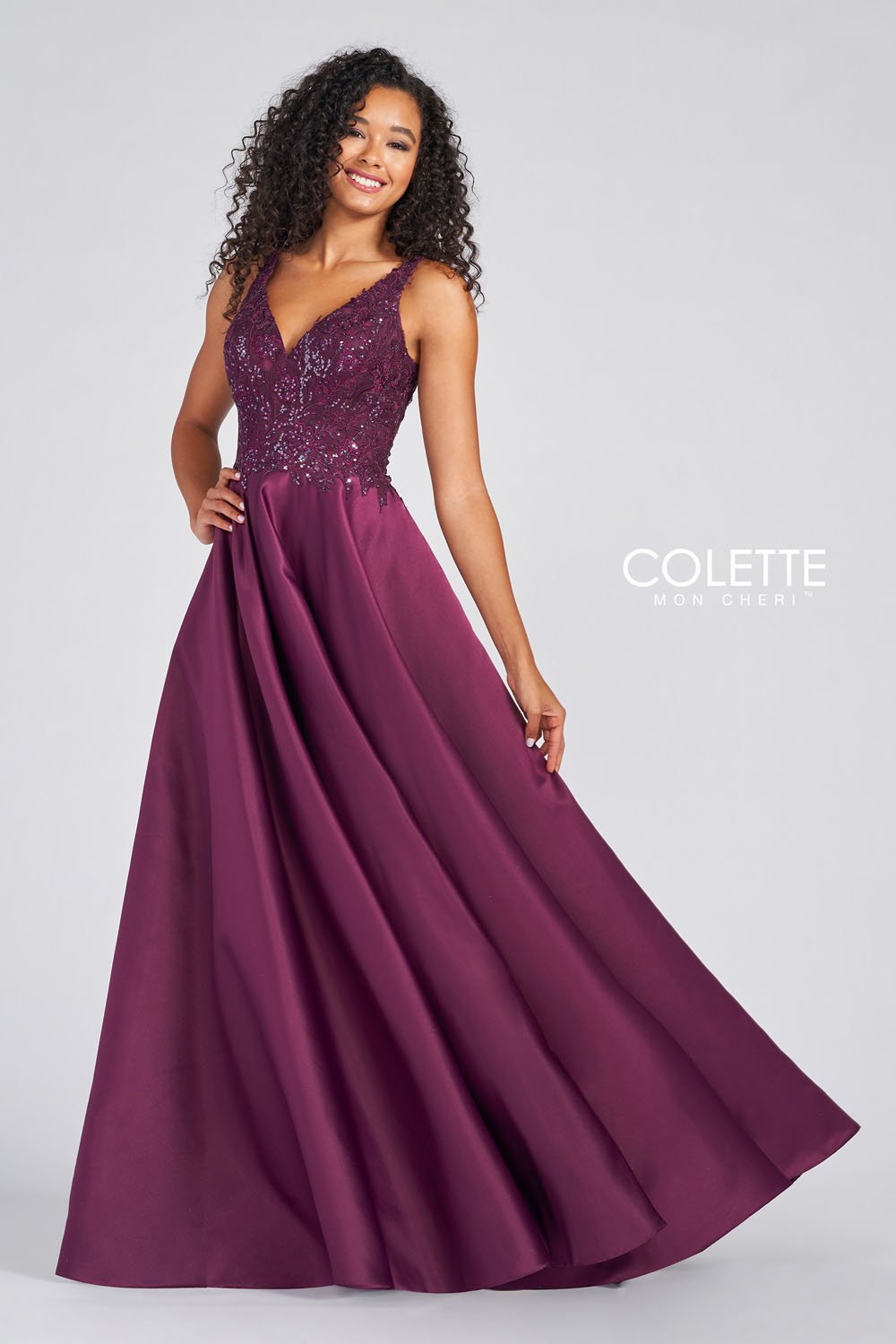 Colette CL12271 prom dress images. Colette CL12271 is available in these colors: Plum, Emerald.
