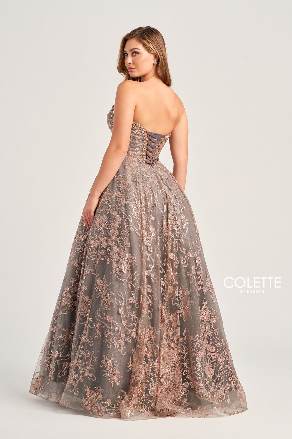 Colette CL5101 prom dress images. Colette CL5101 is available in these colors: Navy Gold, Gold Pewter, Gold White, Fuchsia Gold, Turquoise Gold.