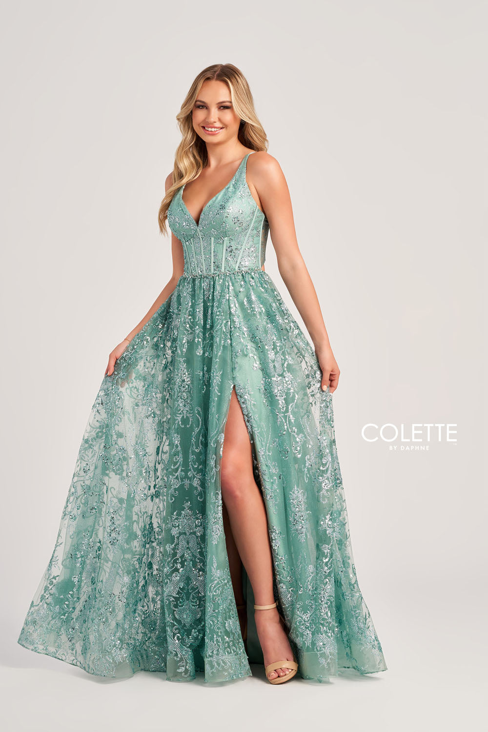Colette CL5134 prom dress images. Colette CL5134 is available in these colors: Navy Blue Gold, Gold Pewter, Sage.