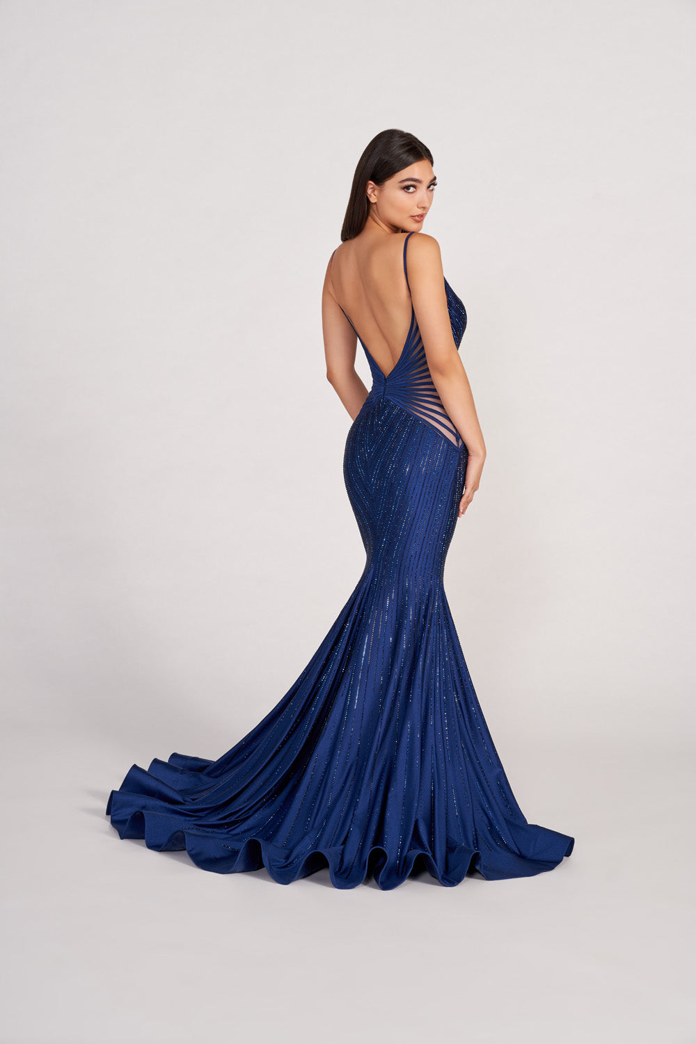 Ellie Wilde EW34002 prom dress images. Ellie Wilde EW34002 is available in these colors: Navy Blue, Ruby, Emerald, Purple, Black, Hot Pink, Light Blue, English Rose.
