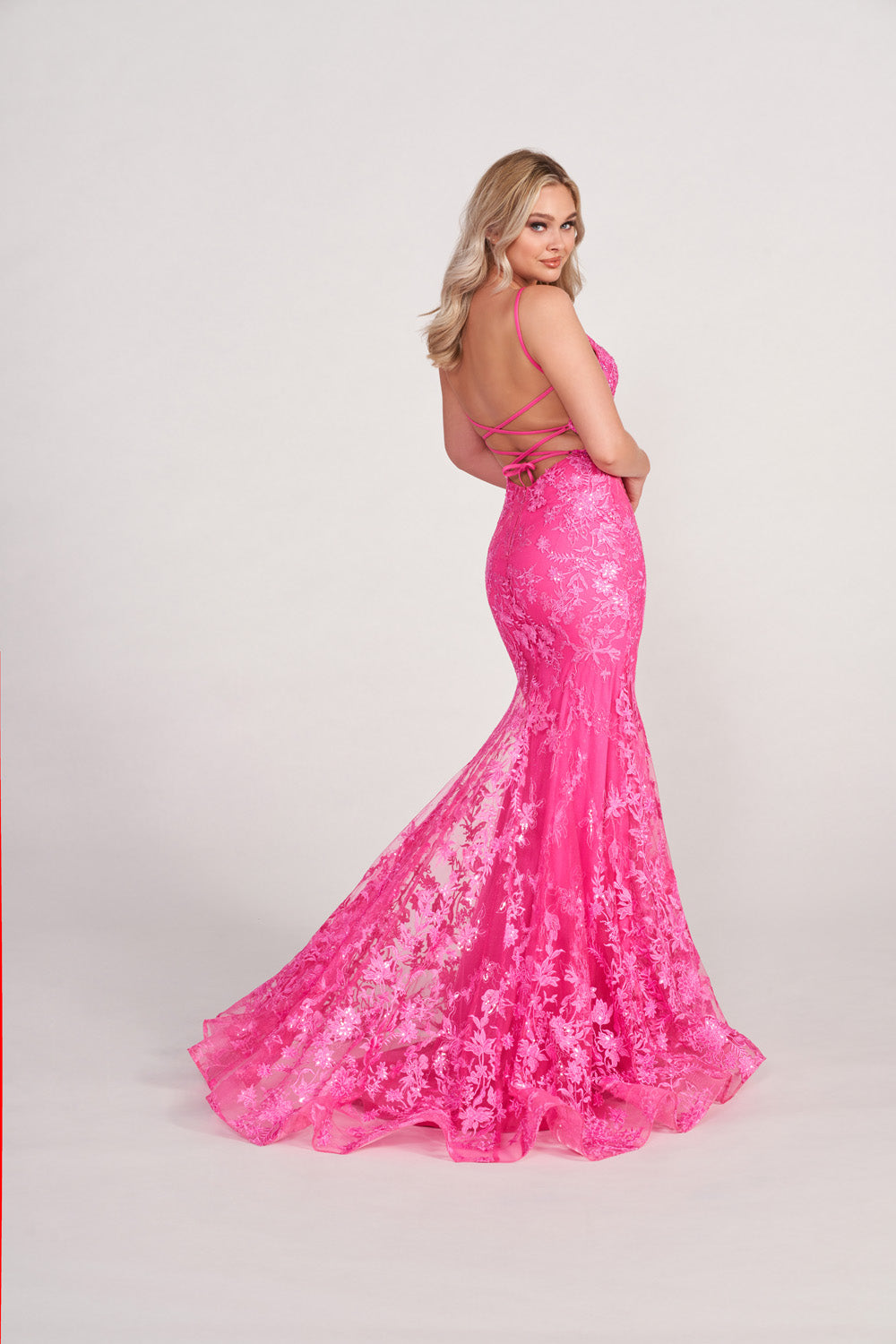 Ellie Wilde EW34009 prom dress images. Ellie Wilde EW34009 is available in these colors: Cerise, Emerald, Light Blue, Ruby.