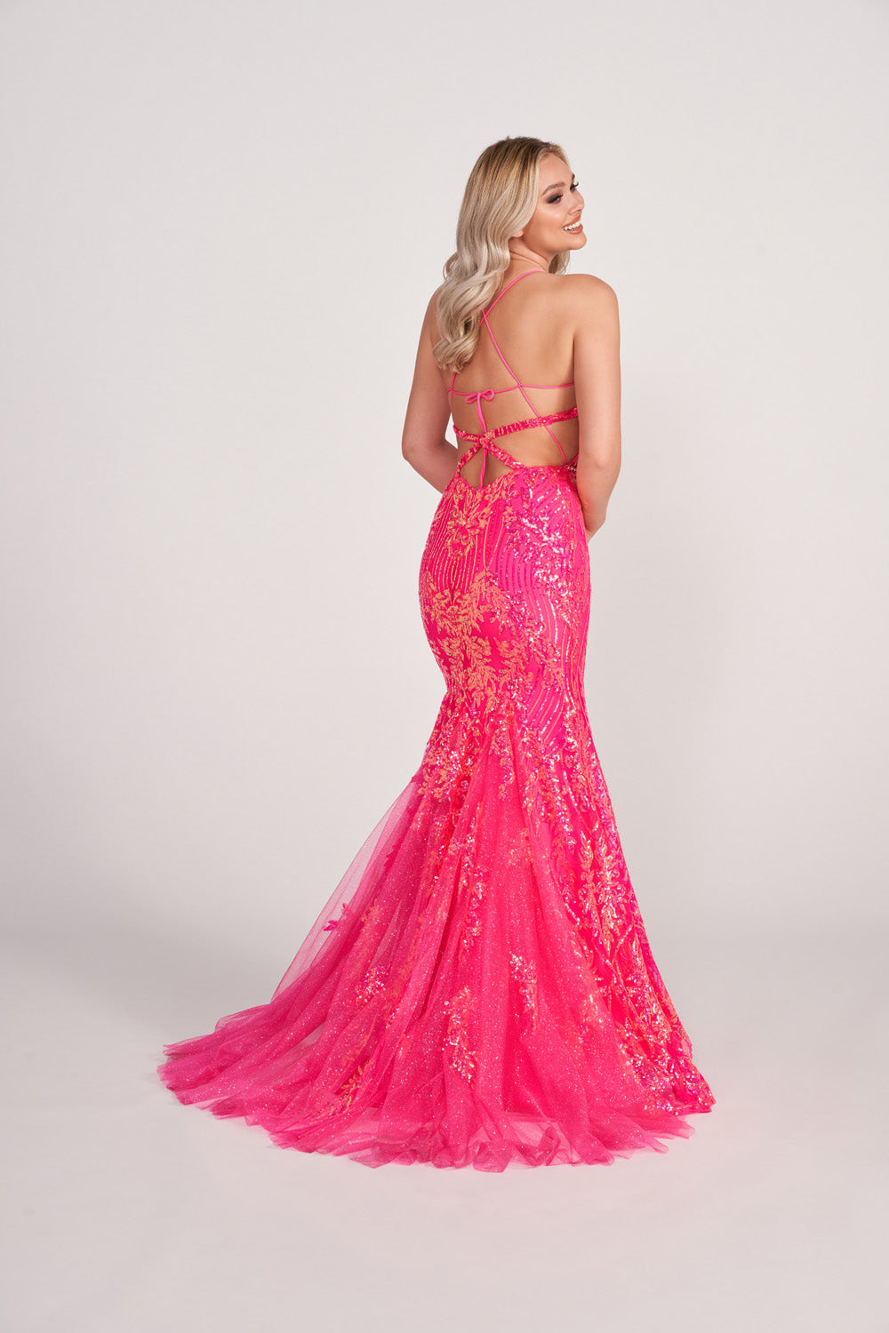 Ellie Wilde EW34023 prom dress images. Ellie Wilde EW34023 is available in these colors: Hot Pink, Peach Champagne, Ocean Blue, Neon Yellow.