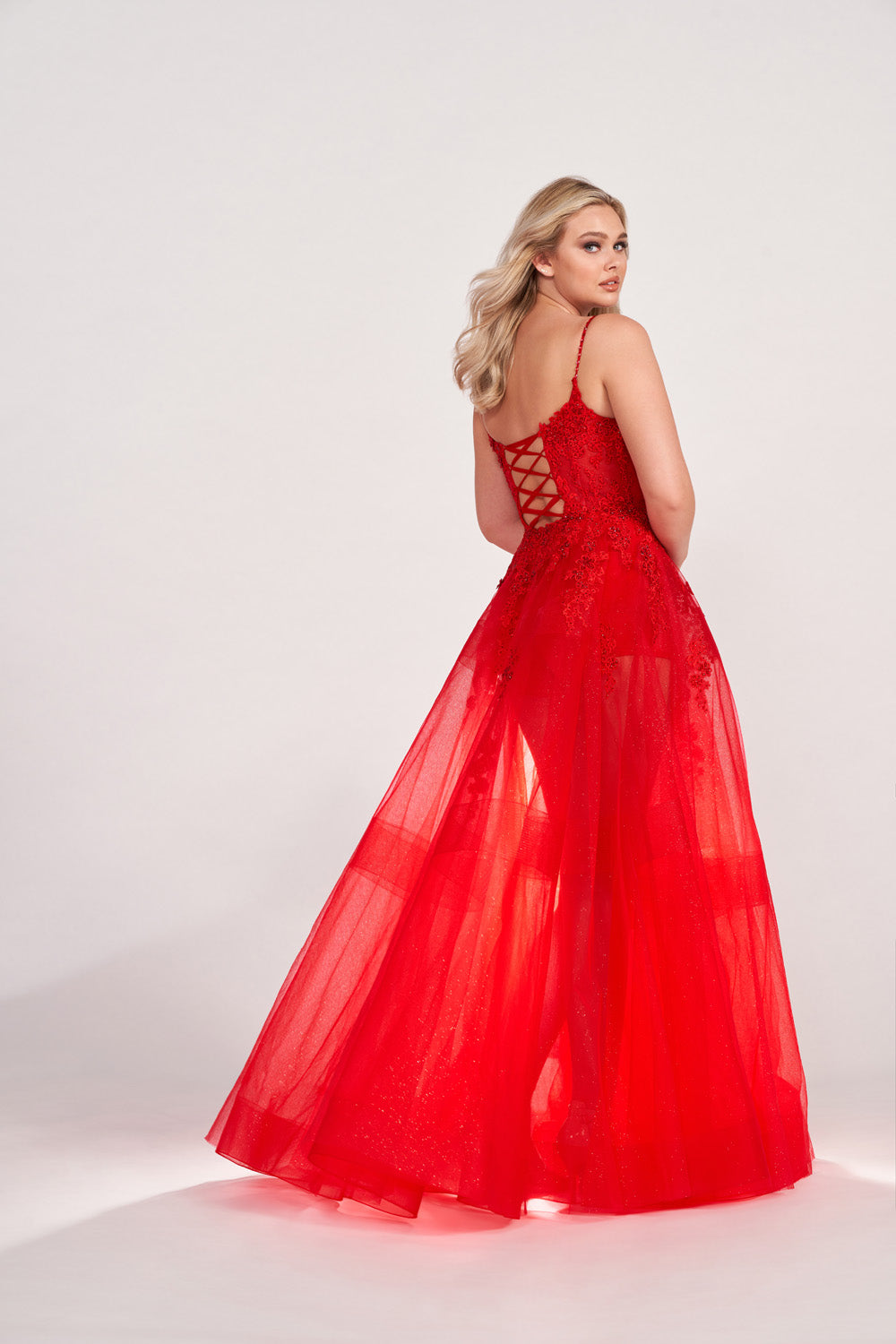 Ellie Wilde EW34032 prom dress images. Ellie Wilde EW34032 is available in these colors: Red, Hot Pink, Royal Blue, Black.