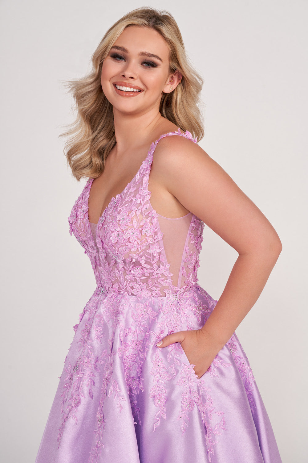 Ellie Wilde EW34050 prom dress images. Ellie Wilde EW34050 is available in these colors: Lilac, Red, Royal Blue, Emerald, Navy Blue, Black.