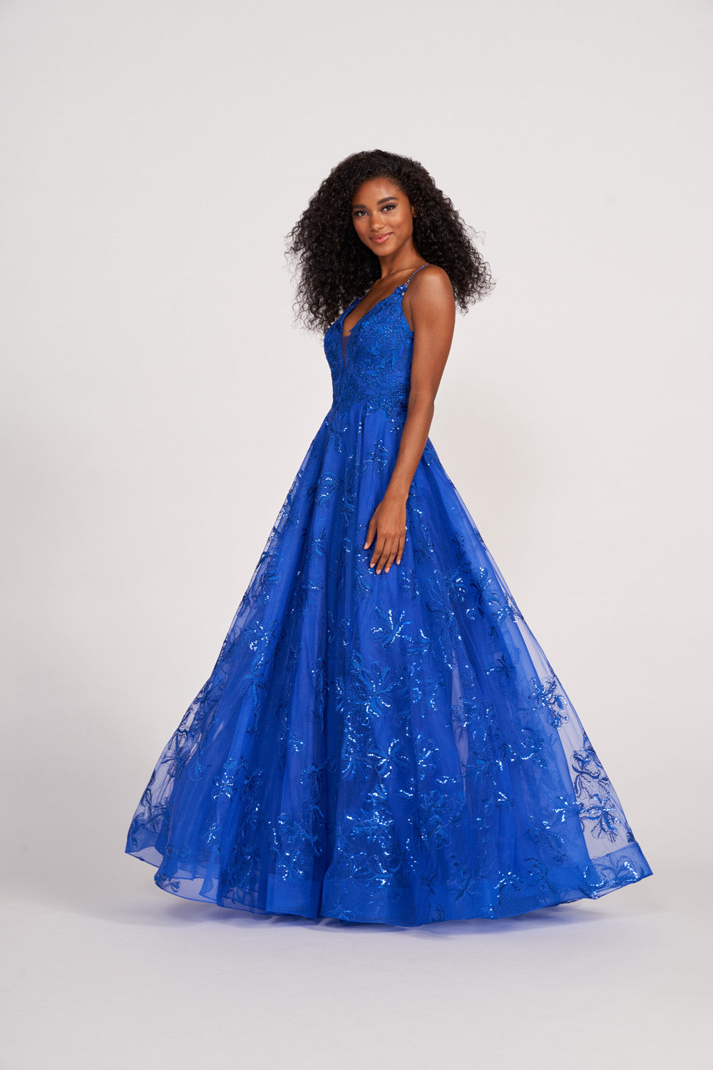 Ellie Wilde EW34051 prom dress images. Ellie Wilde EW34051 is available in these colors: Lavender, Emerald, Magenta, Royal Blue, Yellow.