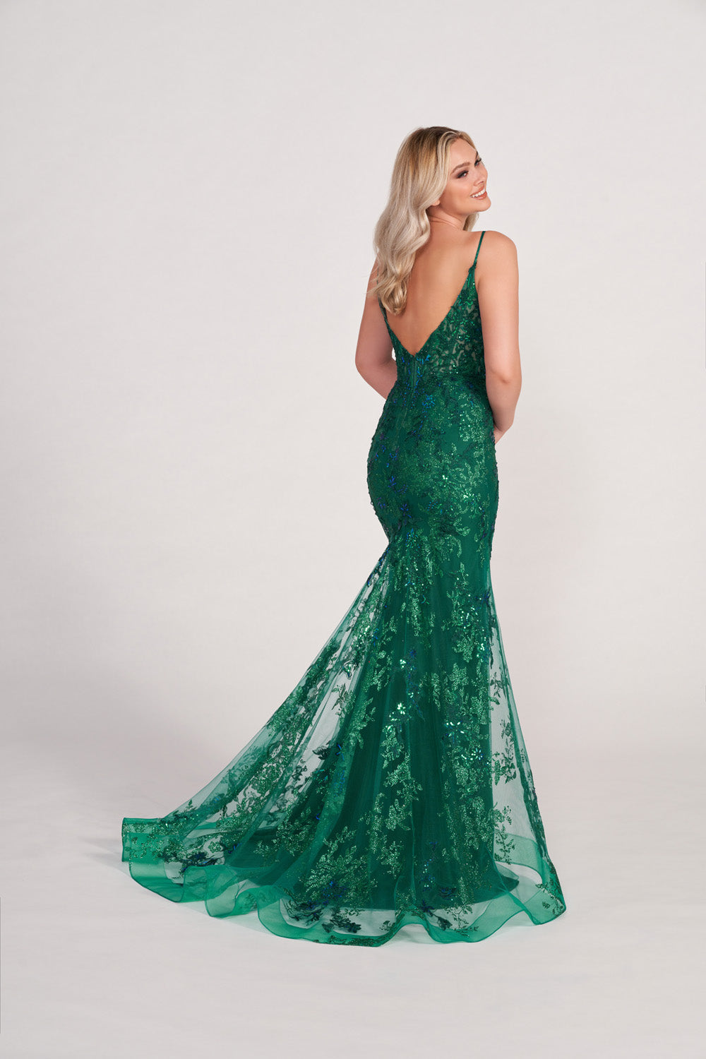 Ellie Wilde EW34061 prom dress images. Ellie Wilde EW34061 is available in these colors: Emerald, Ruby, Magenta.