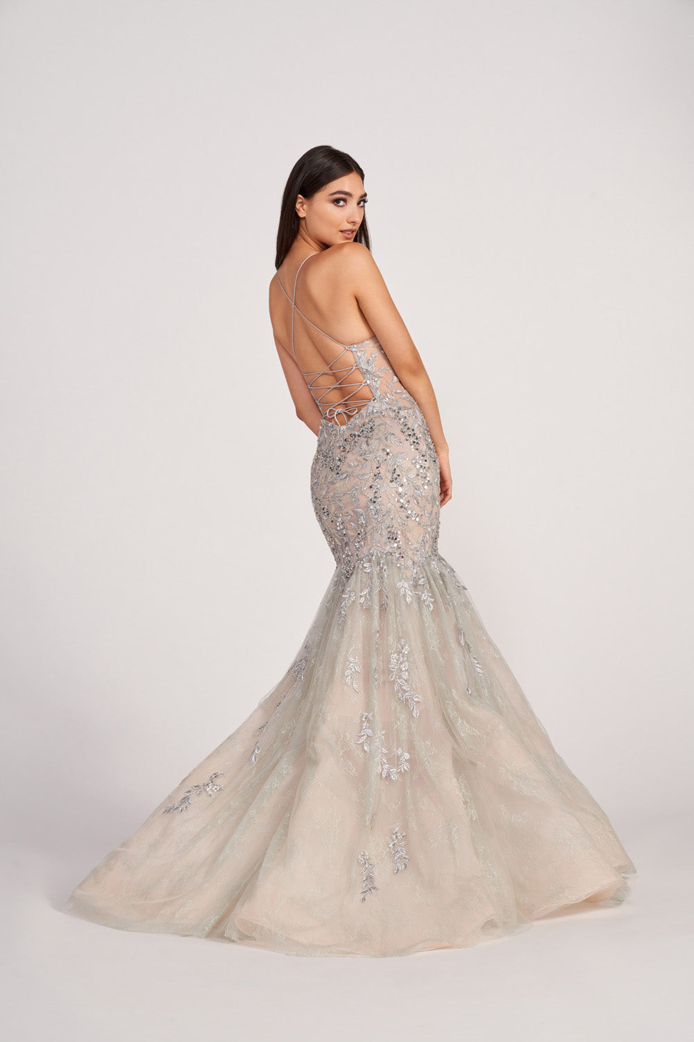Ellie Wilde EW34064 prom dress images. Ellie Wilde EW34064 is available in these colors: Silver Nude, Emerald Nude, Navy Nude.