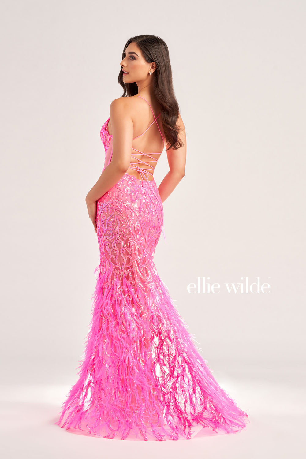 Ellie Wilde EW35006 prom dress images. Ellie Wilde EW35006 is available in these colors: Orange, Champagne, Emerald, Iris, Hot Pink.