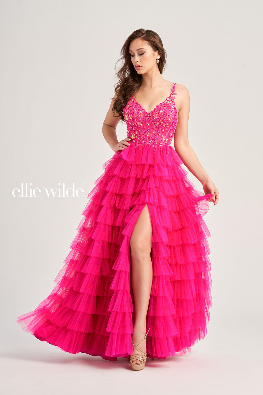 Ellie Wilde EW35059 prom dress images. Ellie Wilde EW35059 is available in these colors: Magenta, Royal Blue, Black, Barbie Pink.