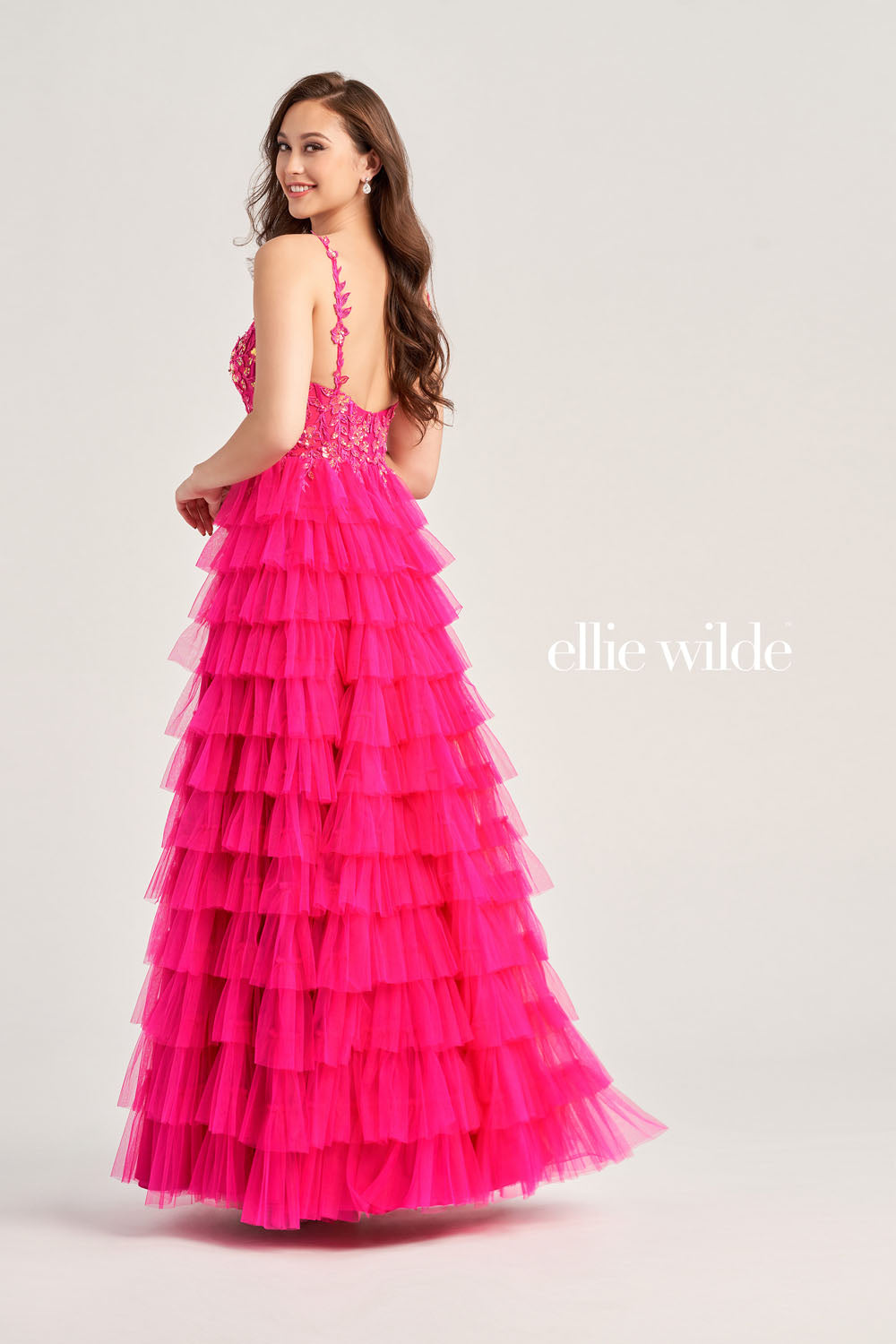 Ellie Wilde EW35059 prom dress images. Ellie Wilde EW35059 is available in these colors: Magenta, Royal Blue, Black, Barbie Pink.