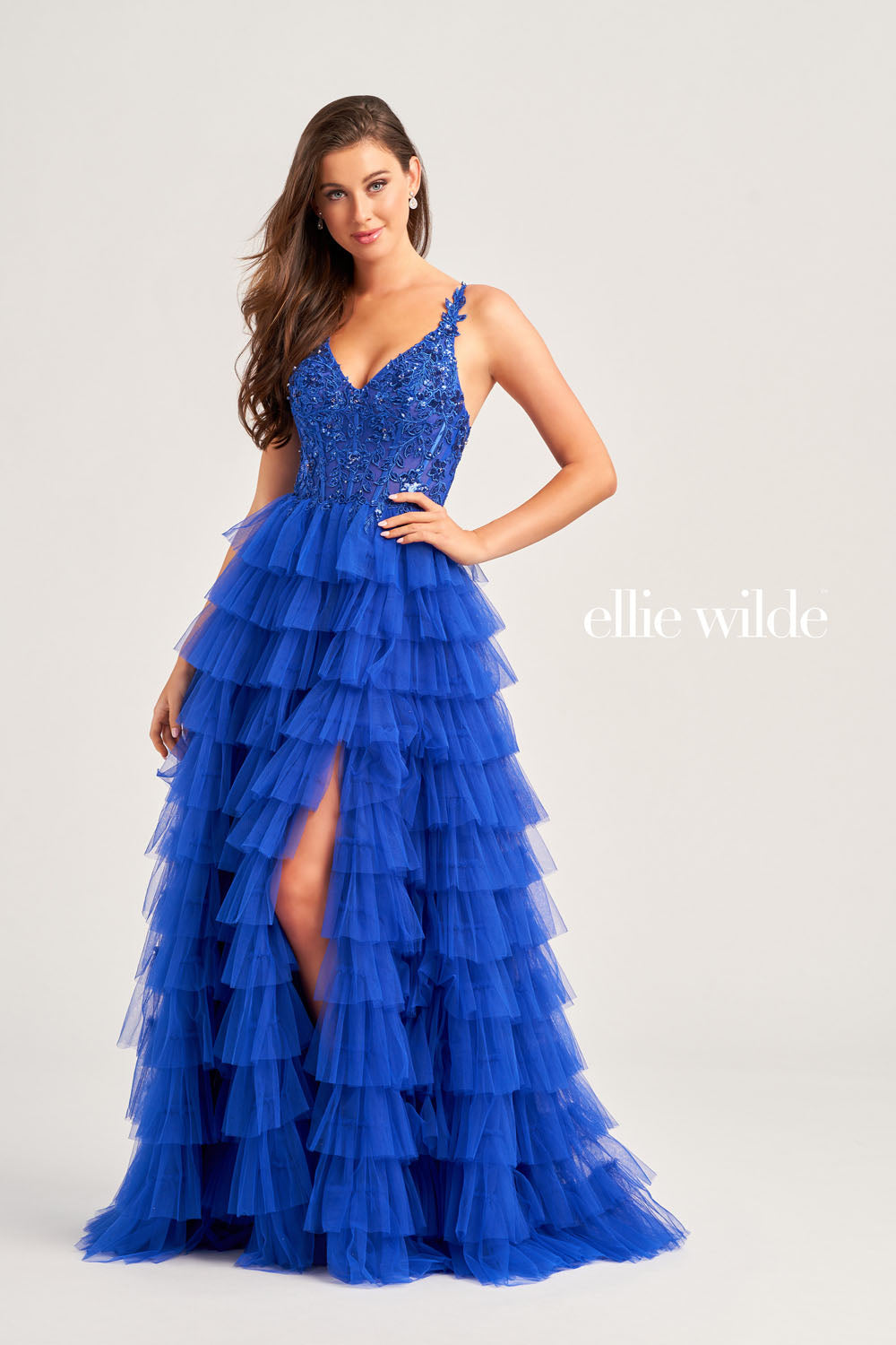 Ellie Wilde EW35059 prom dress images. Ellie Wilde EW35059 is available in these colors: Magenta, Royal Blue, Black, Barbie Pink.