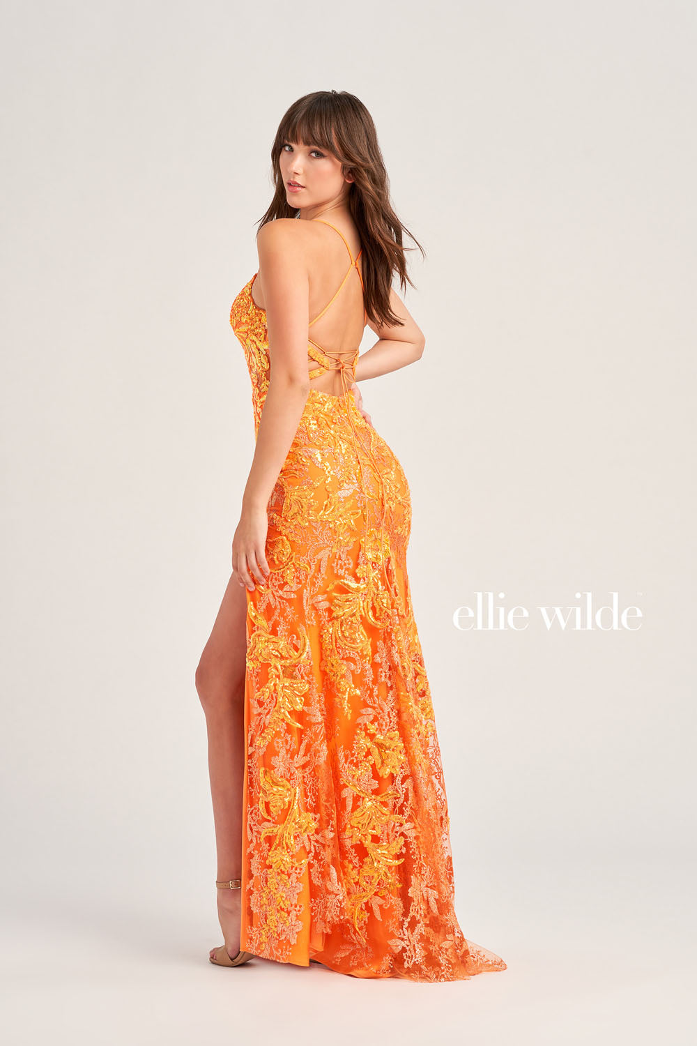 Ellie Wilde EW35060 prom dress images. Ellie Wilde EW35060 is available in these colors: Orange, Light Blue, Hot Pink.