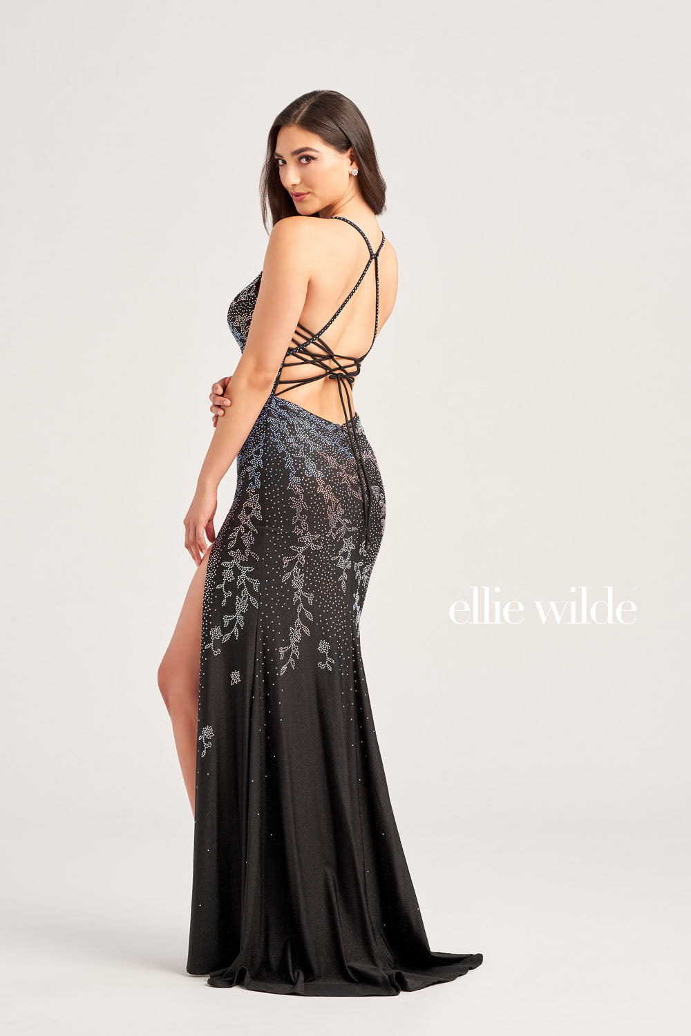 Ellie Wilde EW35061 prom dress images. Ellie Wilde EW35061 is available in these colors: Black Galaxy, Emerald, Royal Blue.