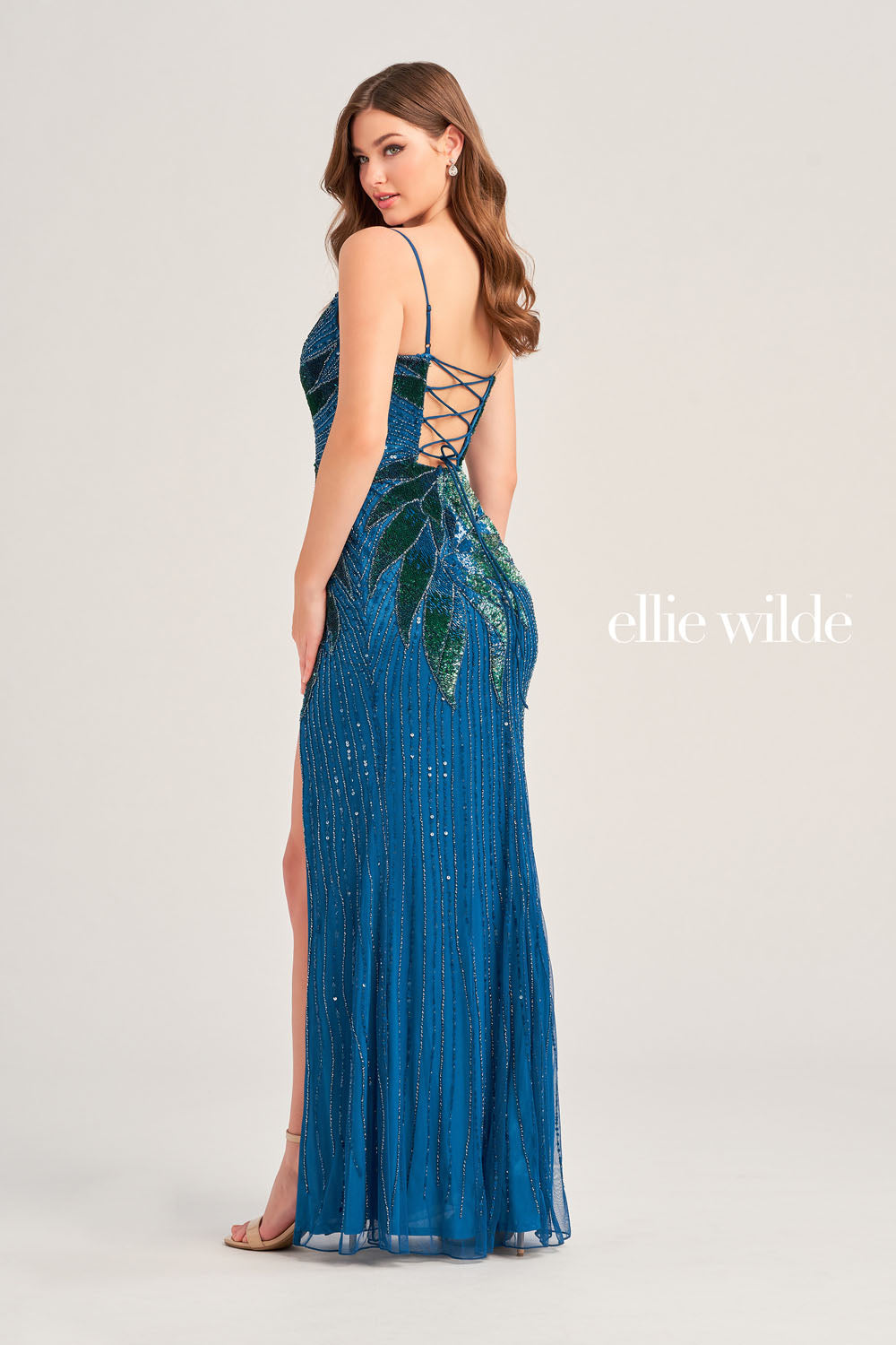 Ellie Wilde EW35066 prom dress images. Ellie Wilde EW35066 is available in these colors: Peacock, Orange.