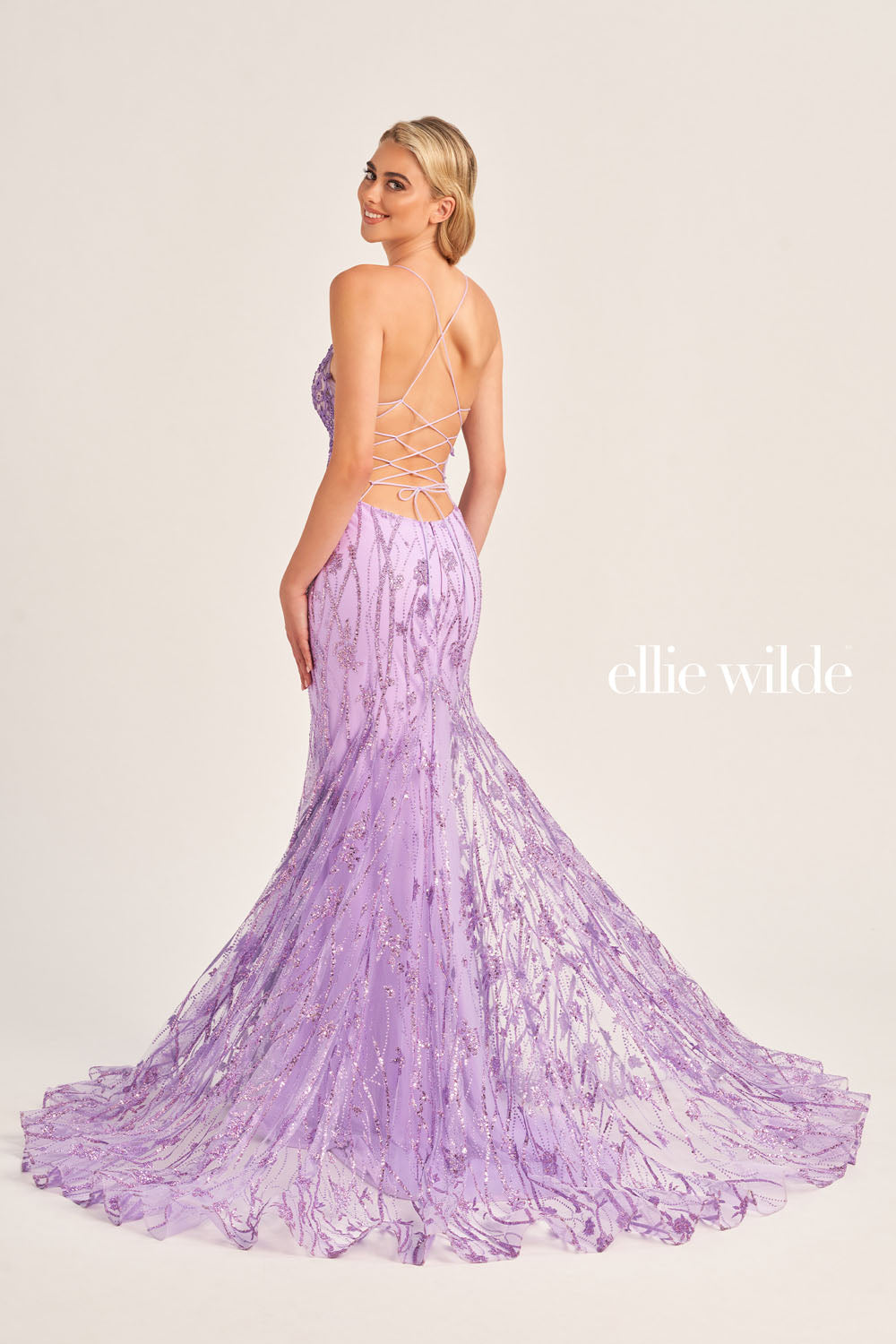 Ellie Wilde EW35104 prom dress images. Ellie Wilde EW35104 is available in these colors: Sea Glass, Royal Blue, Orange, Lilac, Emerald.