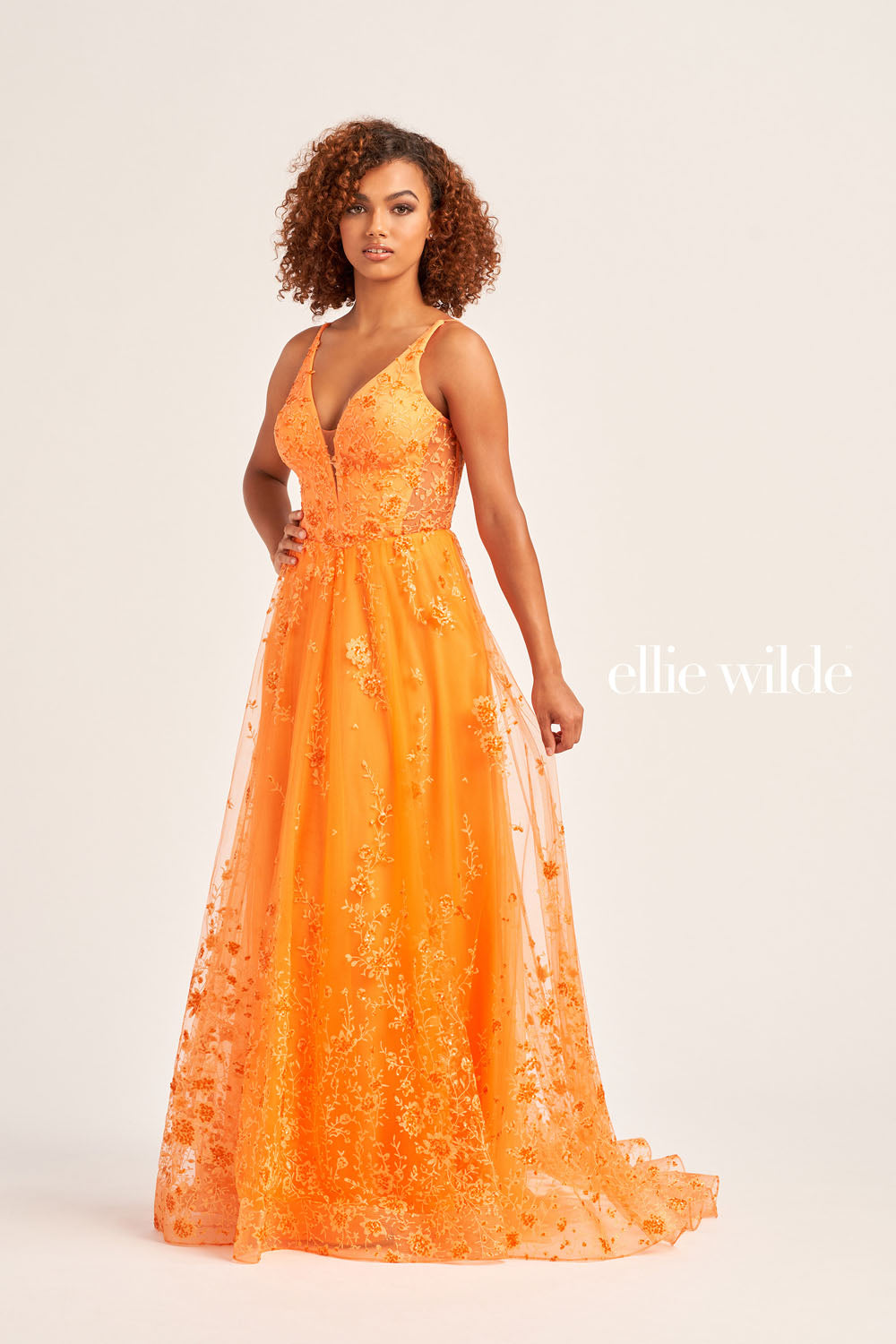 Ellie Wilde EW35105 prom dress images. Ellie Wilde EW35105 is available in these colors: Sea Glass, Royal Blue, Orange, Lilac, Emerald, Magenta, Strawbery.