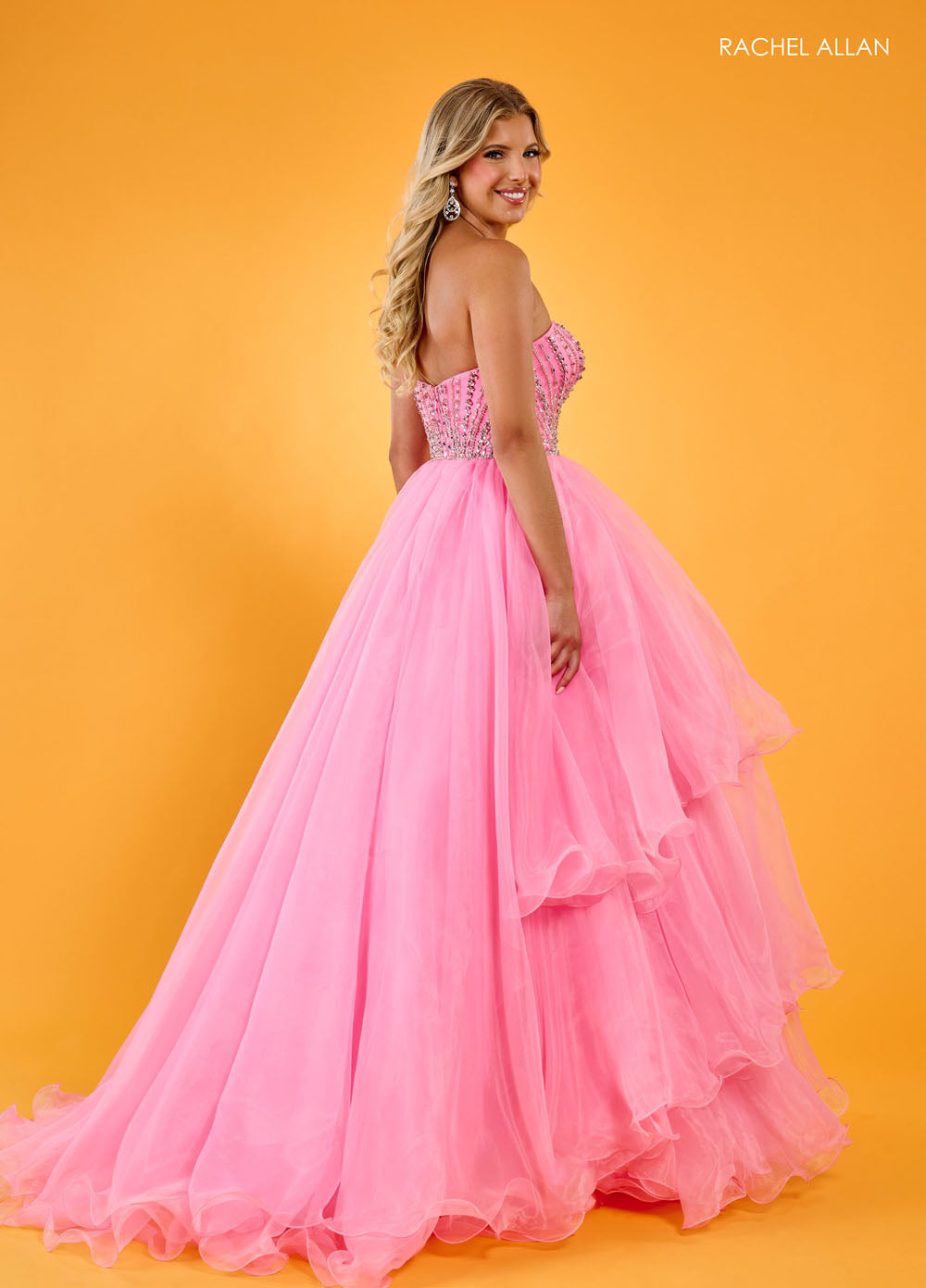 Rachel Allan 70570 prom dress images. Rachel Allan 70570 is available in these colors: Aqua, Lilac, Pink.