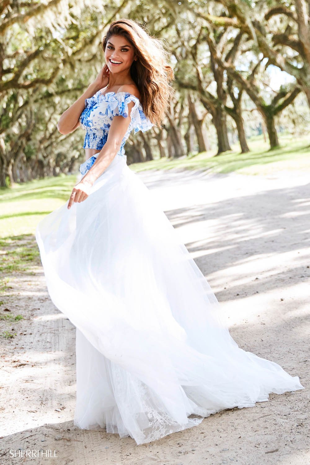 Sherri Hill 52910 prom dress images. Sherri Hill 52910 is available in these colors: Blue Ivory Print.