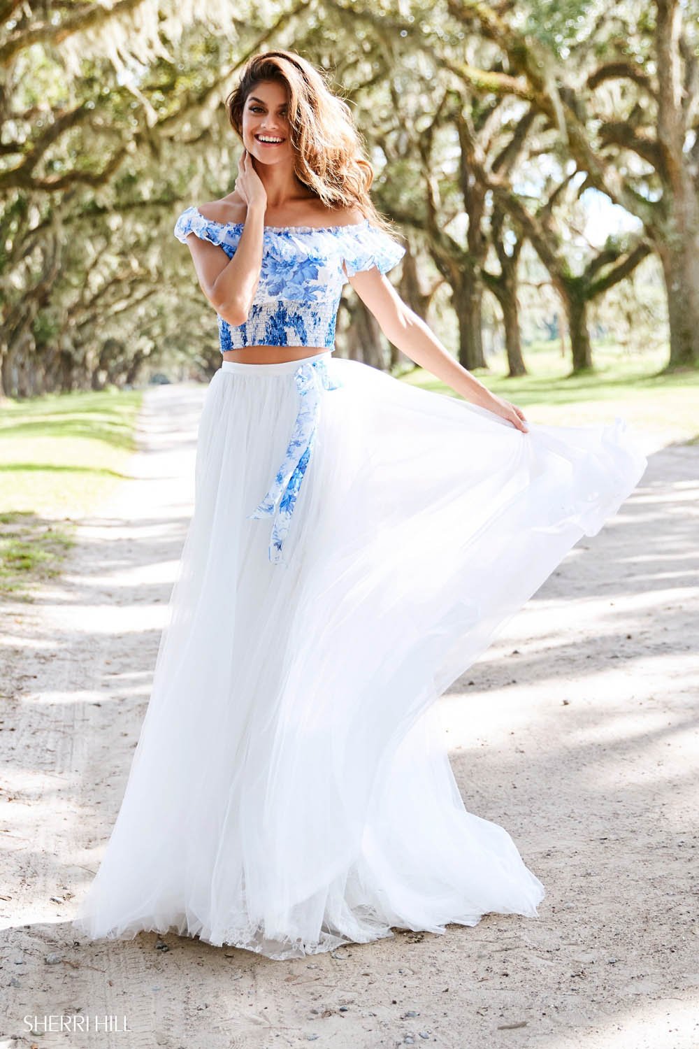 Sherri Hill 52910 prom dress images. Sherri Hill 52910 is available in these colors: Blue Ivory Print.