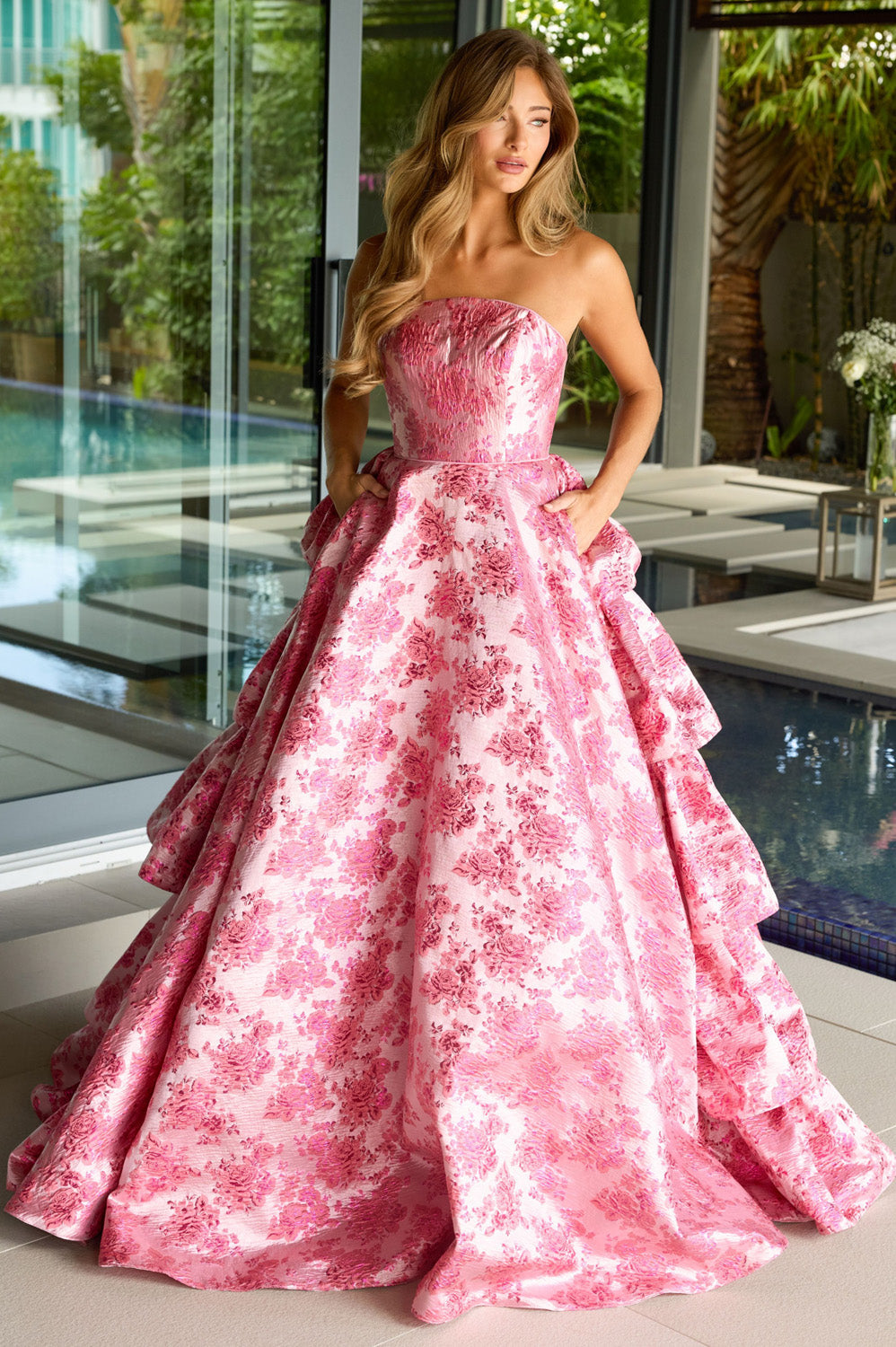 Ava Presley 26412 Strapless blush prom dress with floral pattern and full ballgown silhouette.