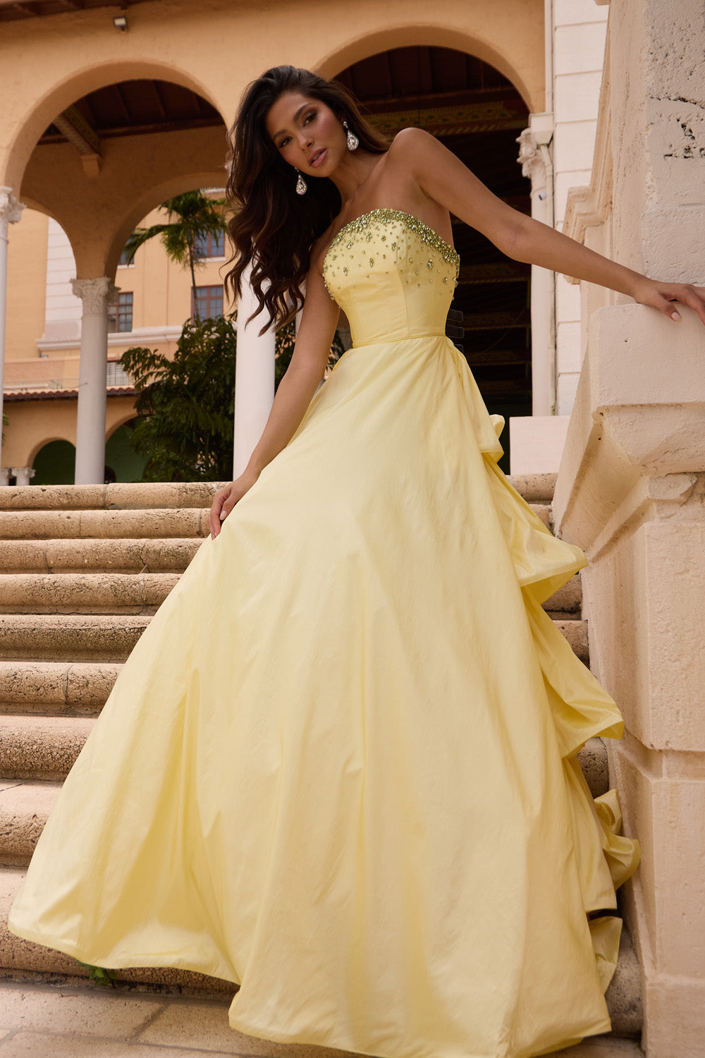 Ava Presley 26417 Soft yellow A-line prom dress with beaded bodice and flowing skirt.