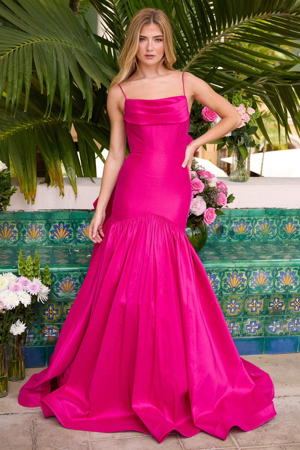 Ava Presley 26422 Magenta mermaid prom dress with a ruffled hem and spaghetti straps, front view.