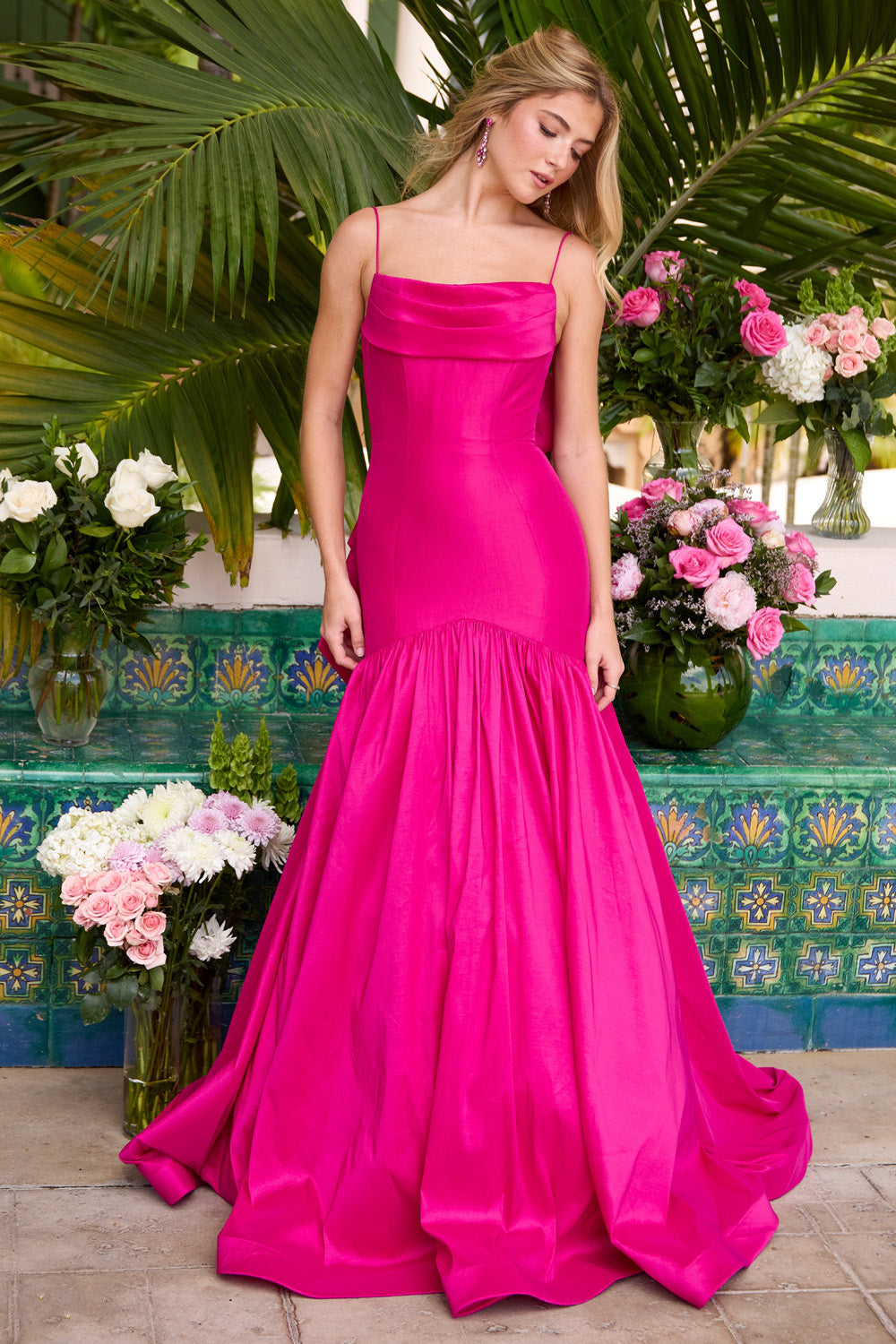 Ava Presley 26422 Magenta mermaid prom dress with a ruffled skirt and elegant cowl neckline.