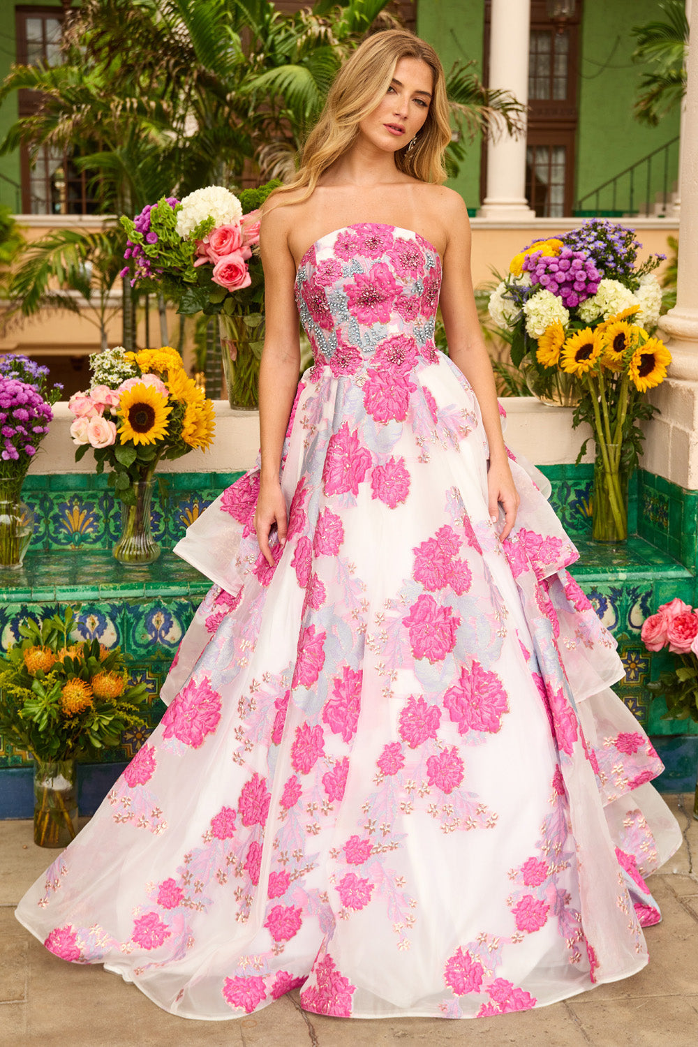 Ava Presley 42292 Strapless A-line prom dress in white with pink floral appliqués and beaded bodice.