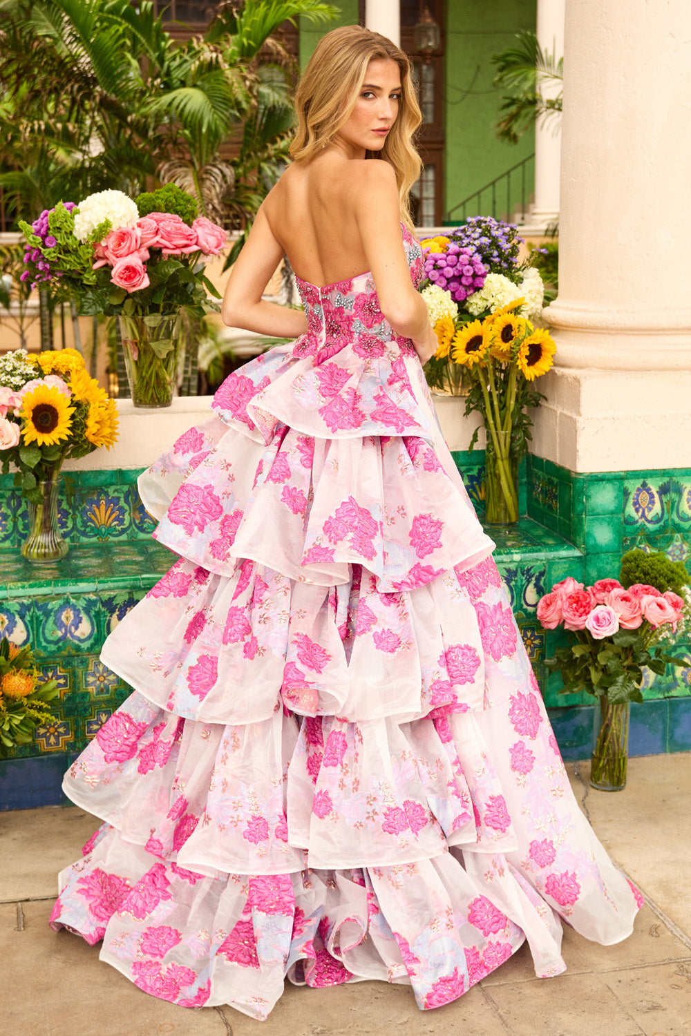 Ava Presley 42292 White and pink tiered prom dress with a corset back and floral detailing.