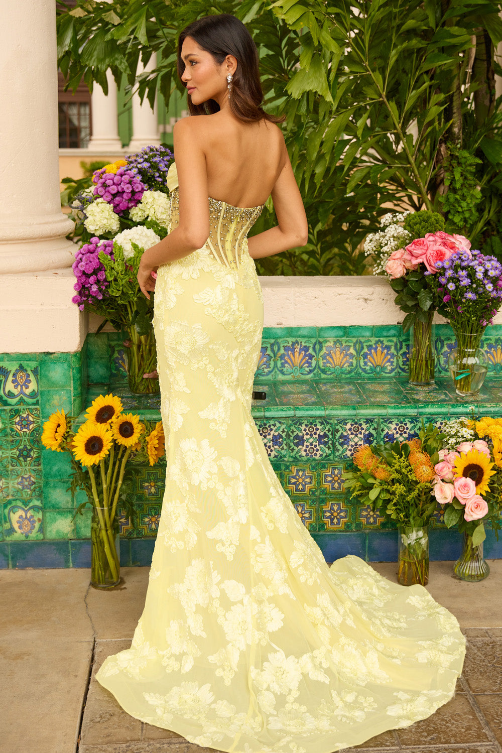 Ava Presley 42297 Yellow mermaid prom dress with beaded corset and floral lace detailing, back view.