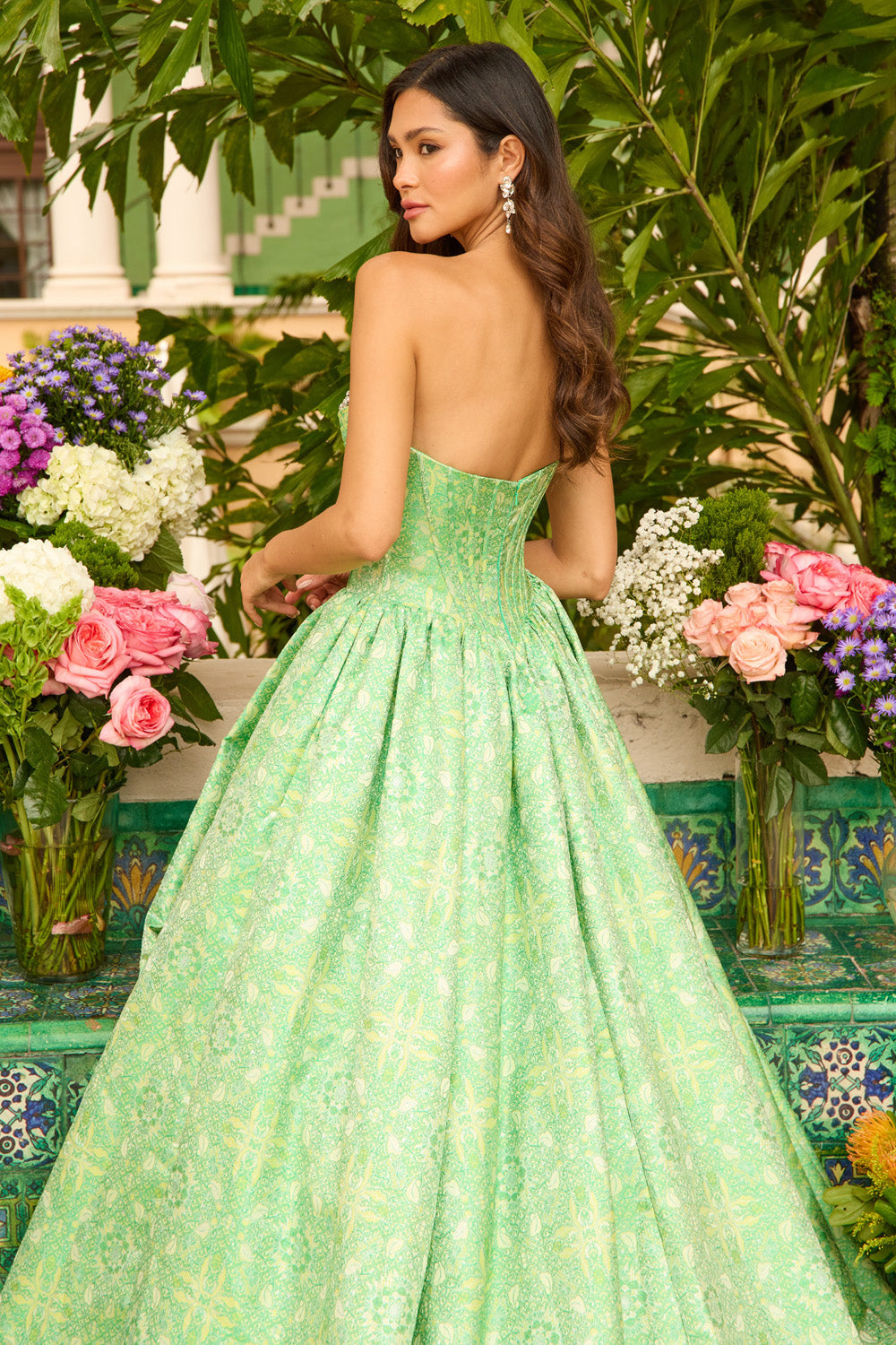 Ava Presley 42318 Green ballgown prom dress with a corset back and intricate detailing, back view.