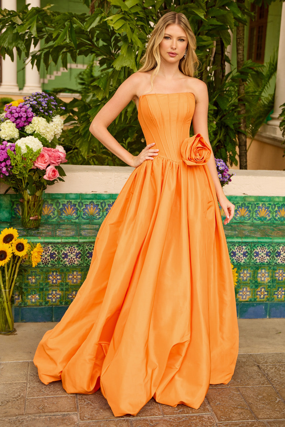 Ava Presley 47204 Strapless orange ballgown with a floral accent, perfect for prom prom dress.