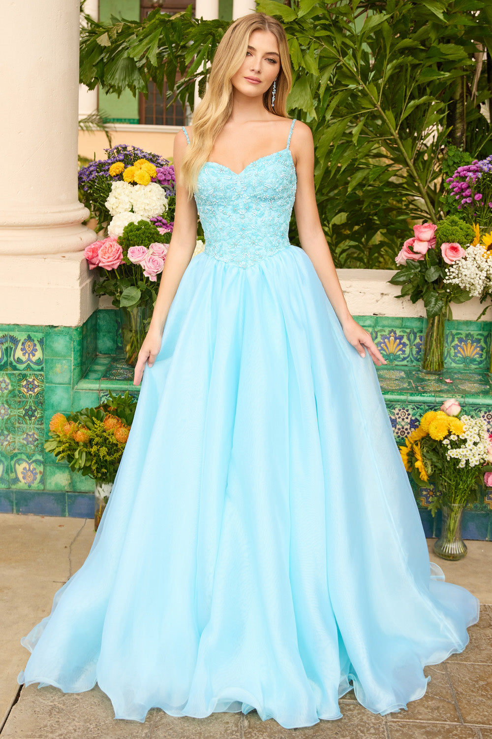 Ava Presley 47242 Light blue A-line prom dress with beaded bodice and flowing skirt.