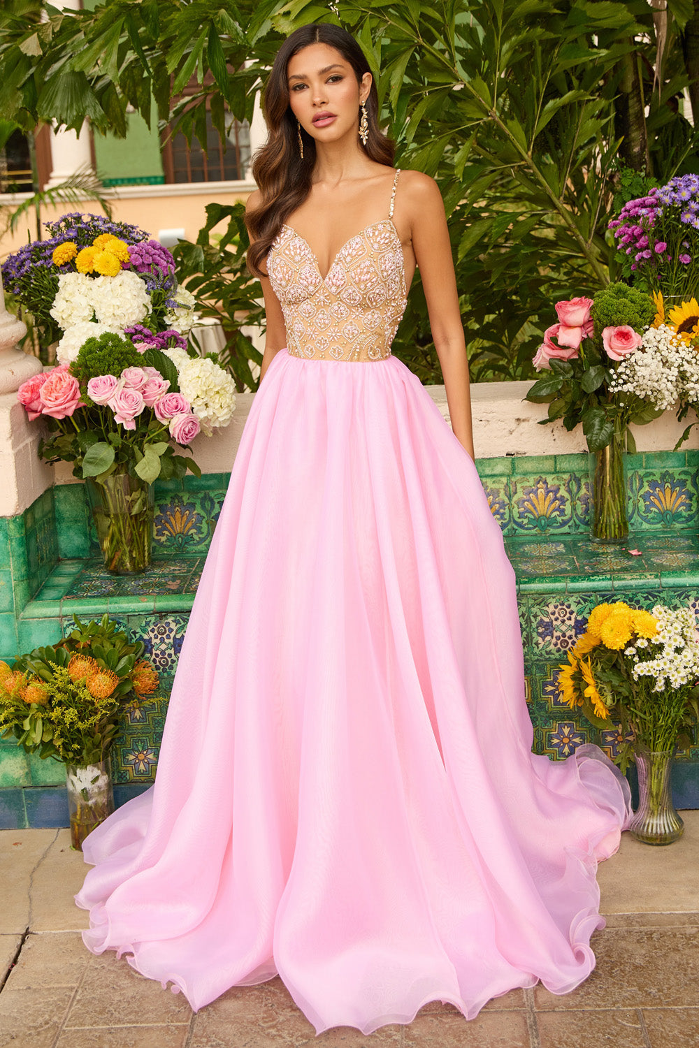 Ava Presley 47243 Nude light pink A-line prom dress with beaded bodice and flowing skirt.