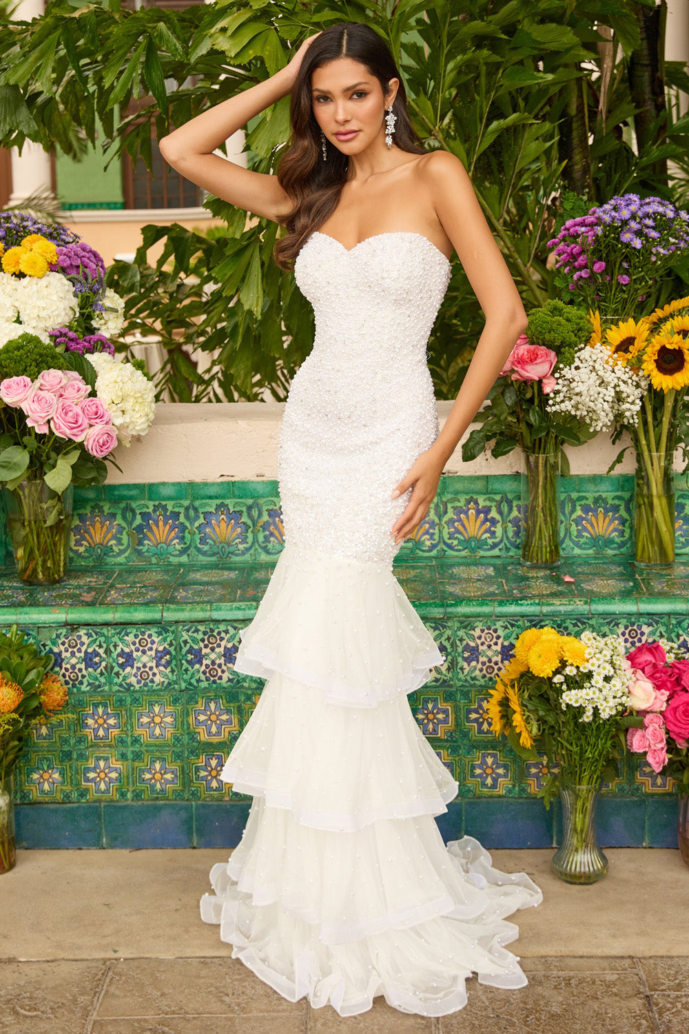 Ava Presley 47251 Ivory mermaid prom dress with beading and layered ruffles, front view.