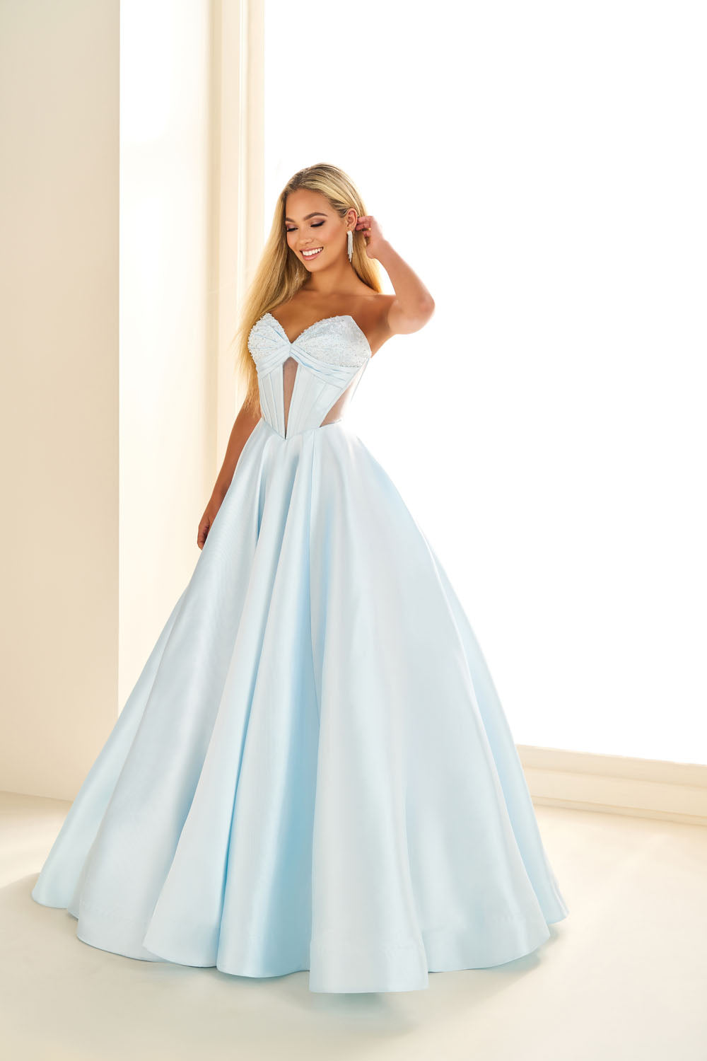 Ellie Wilde EW36025 ball gown prom dress images.  Ellie Wilde EW36025 is available in these colors: Ice Blue, Blue Hydrangea, Red, Emerald, Black, Diamond White.