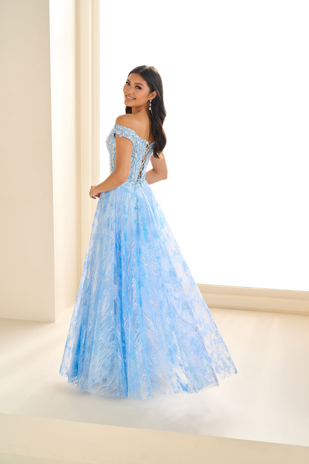 Ellie Wilde EW36039 a-line prom dress images.  Ellie Wilde EW36039 is available in these colors: Sky Blue, Carribean Mist, Lavender Dream, Flamingo Pink.