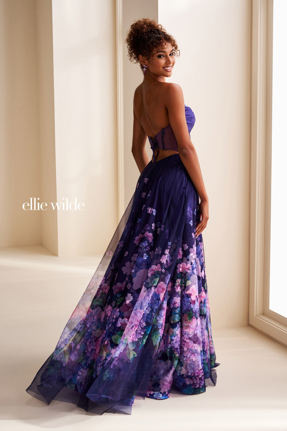 Ellie Wilde EW37003 purple gown with floral print and strapless silhouette prom dress images.