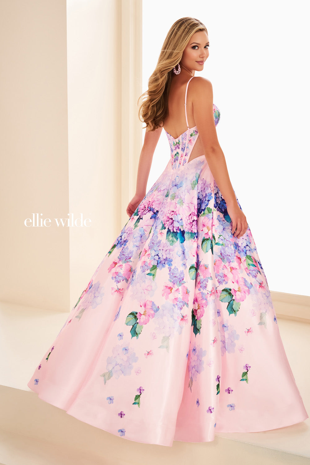 Ellie Wilde EW37004 pink floral ball gown with a fitted bodice prom dress images.