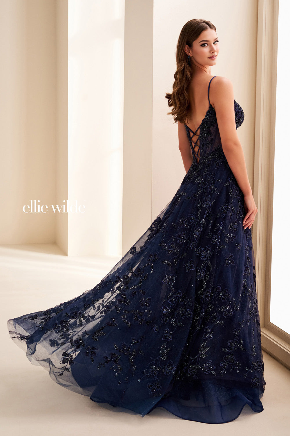 Ellie Wilde EW37067 navy blue, a line silhouette, intricate floral embroidery prom dress images.