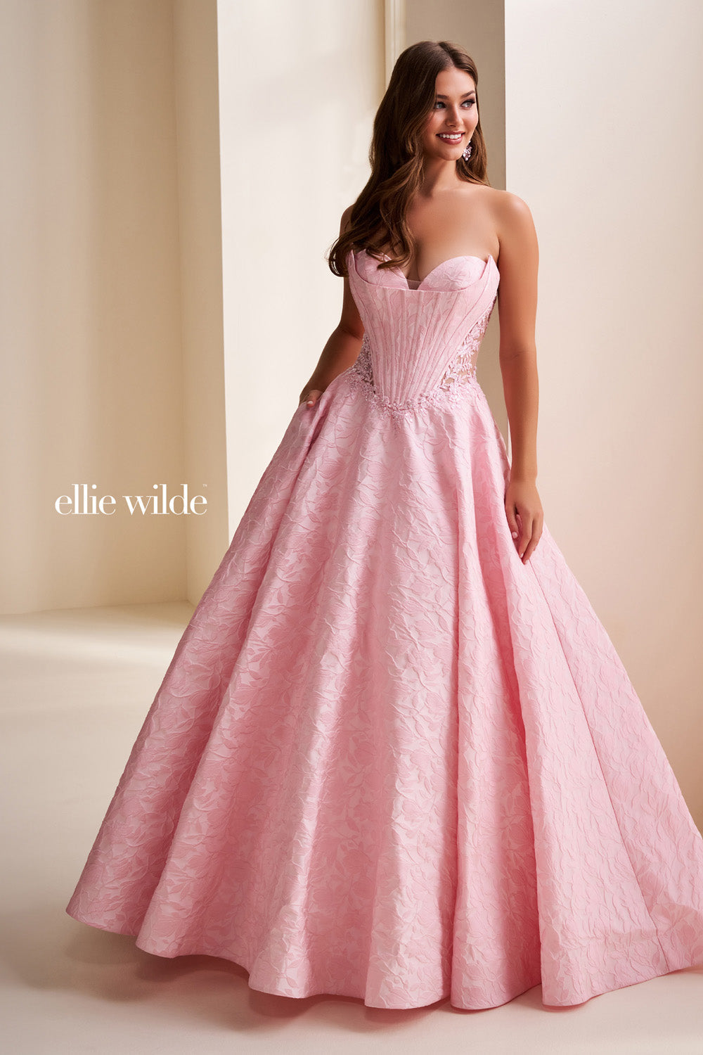 Ellie Wilde EW37080 pink, strapless, ball gown with textured fabric prom dress images.