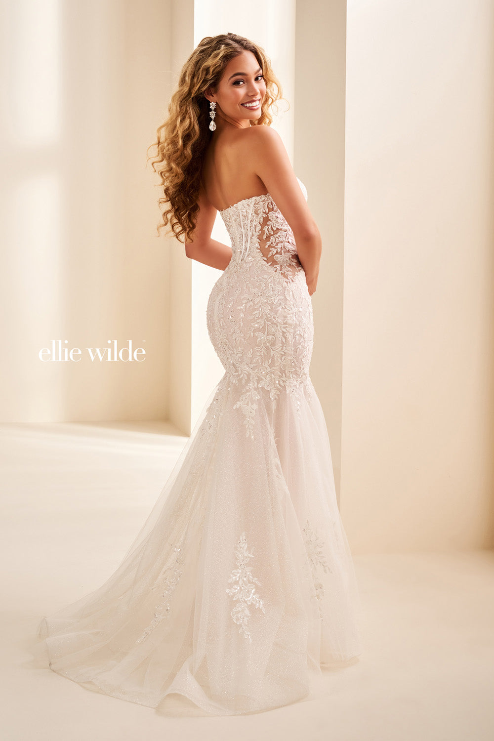 Ellie Wilde EW37085 strapless, fitted silhouette, embellished lace detailing prom dress images.