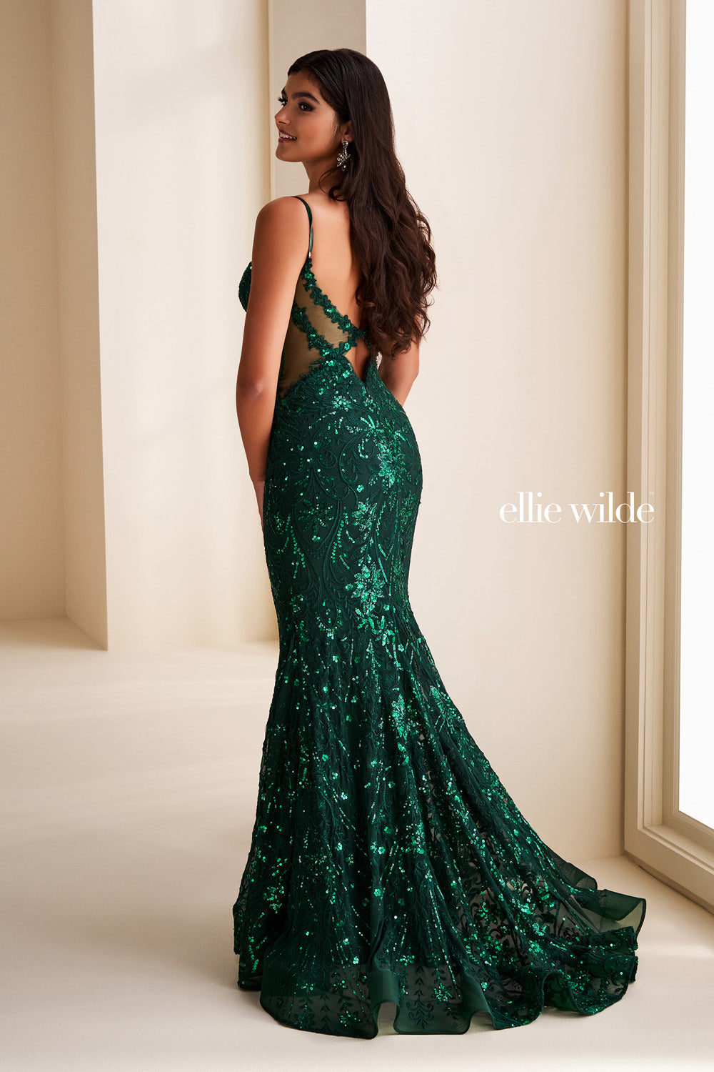 Ellie Wilde EW37204 emerald green, fitted silhouette, open back design prom dress images.