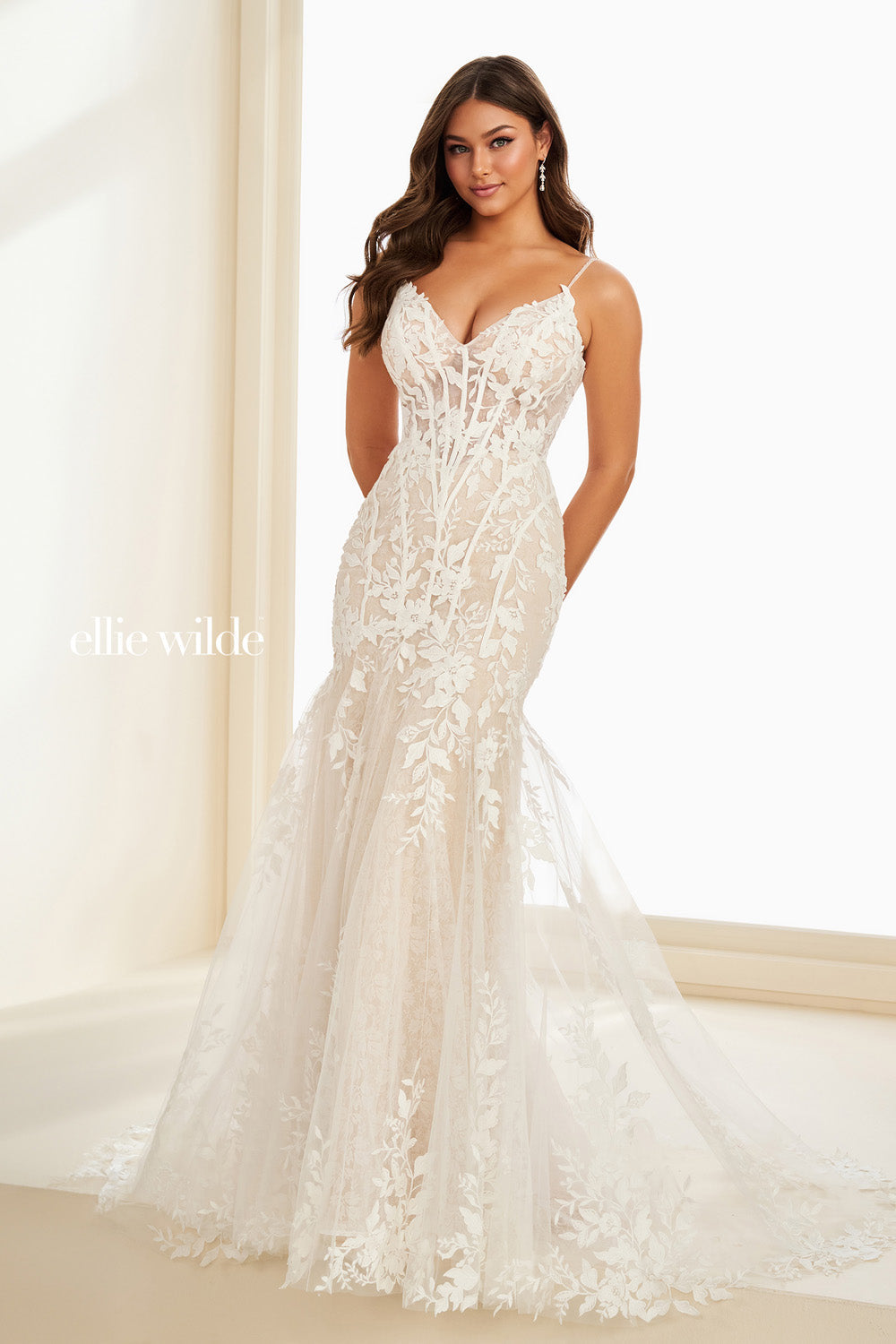 Ellie Wilde EW37216 white mermaid dress with floral lace detailing prom dress images.