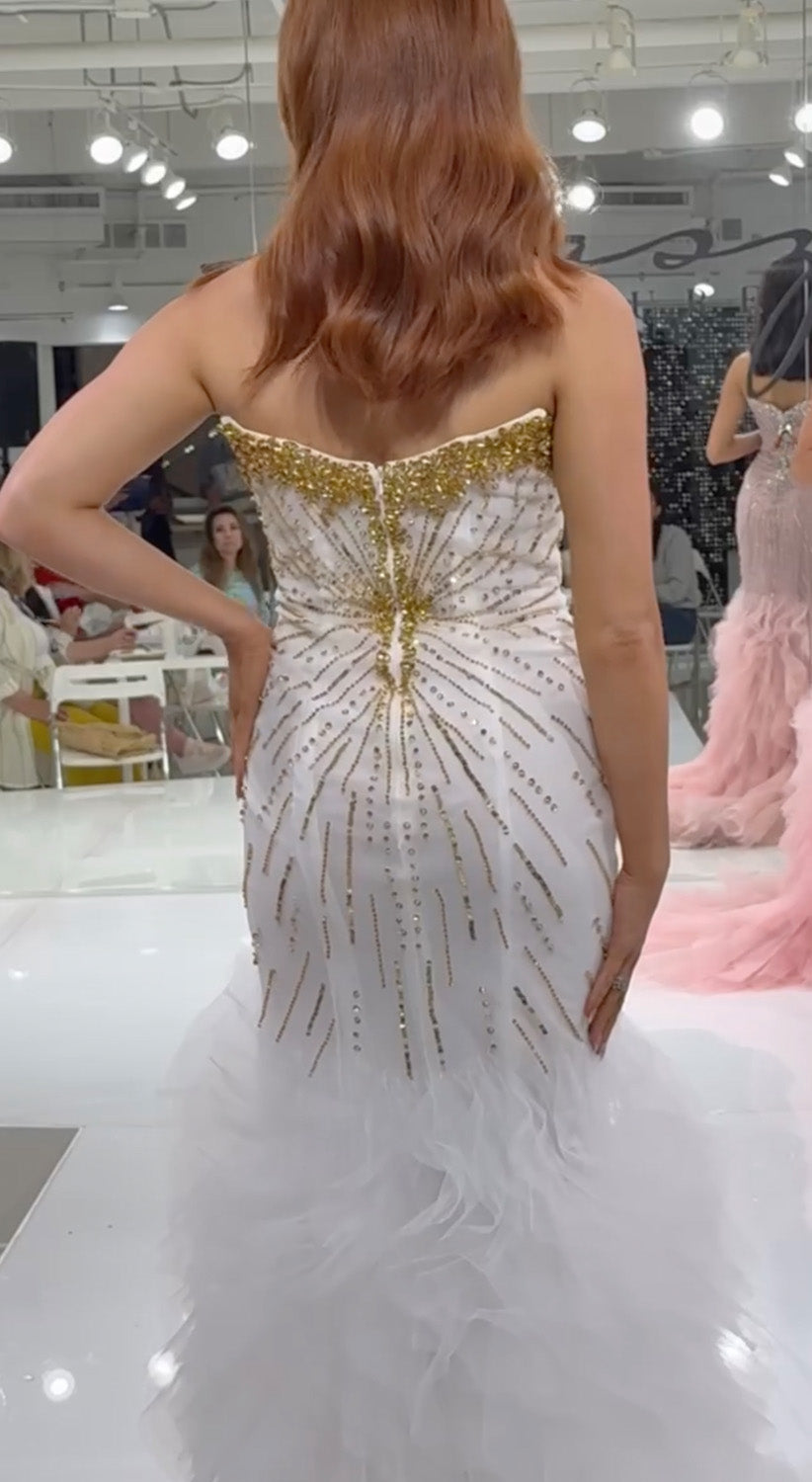 Jasz Couture 7905 White gold mermaid prom dress with beaded detailing and ruffled tulle train, back view.