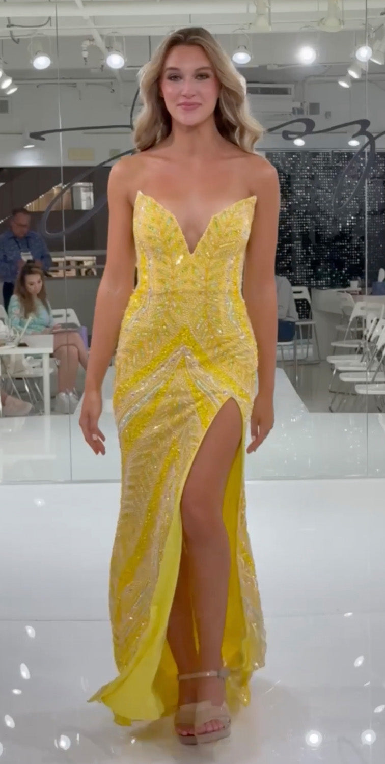 Jasz Couture 7910 Yellow mermaid prom dress with a thigh-high slit and intricate beading, front view.